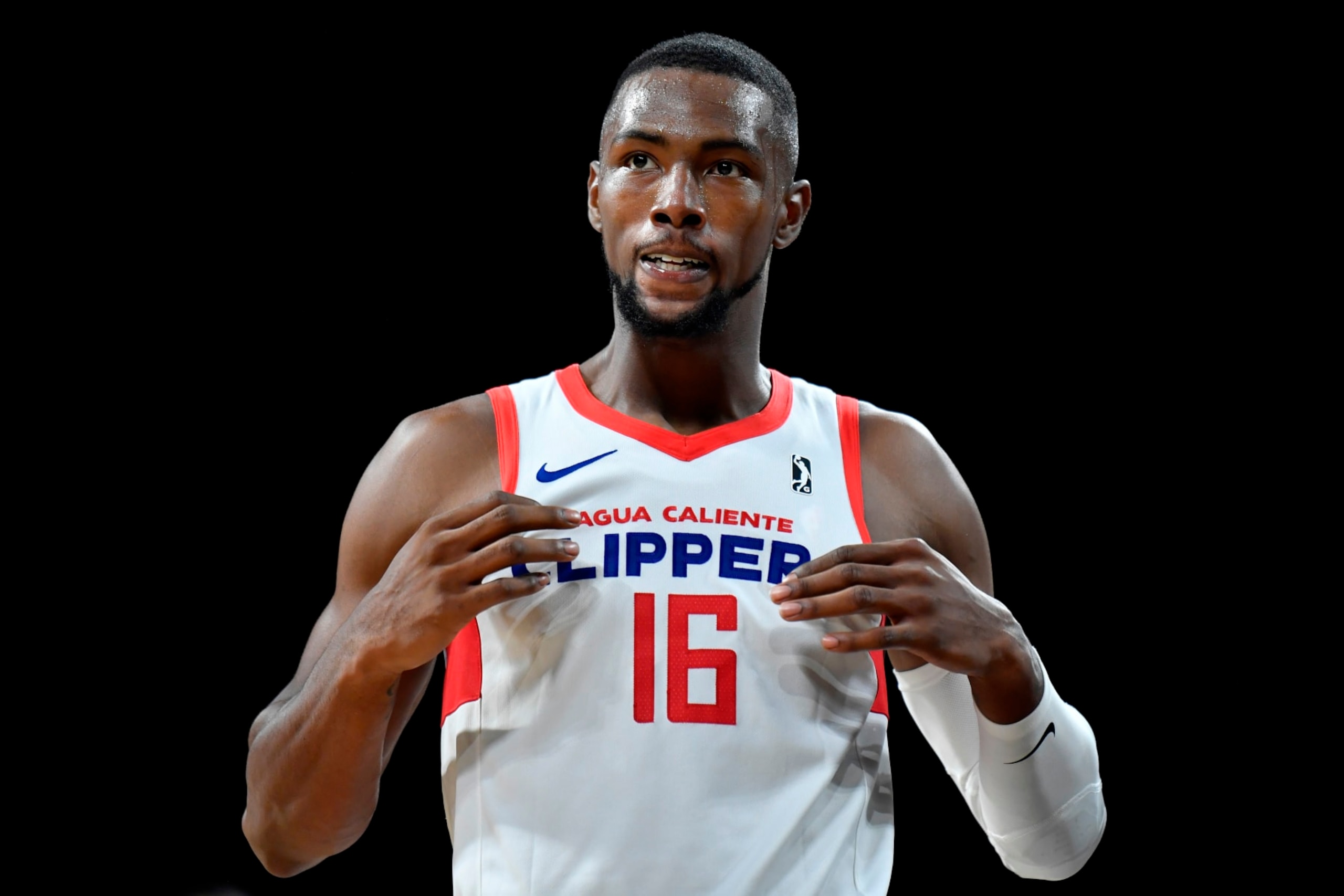 LAS VEGAS, NV - NOVEMBER 10: Harry Giles III #16 of the Agua Caliente Clippers reacts after a play agains the G League Ignite on November 10, 2021 at Mandalay Bay in Las Vegas, Nevada. NOTE TO USER: User expressly acknowledges and agrees that, by downloading and or using this photograph, User is consenting to the terms and conditions of the Getty Images License Agreement. Mandatory Copyright Notice: Copyright 2021 NBAE (Photo by Jeff Bottari/NBAE via Getty Images) LAS VEGAS, NV - NOVEMBER 10: Harry Giles III #16 of the Agua Caliente Clippers reacts after a play agains the G League Ignite on November 10, 2021 at Mandalay Bay in Las Vegas, Nevada. NOTE TO USER: User expressly acknowledges and agrees that, by downloading and or using this photograph, User is consenting to the terms and conditions of the Getty Images License Agreement. Mandatory Copyright Notice: Copyright 2021 NBAE (Photo by Jeff Bottari/NBAE via Getty Images)