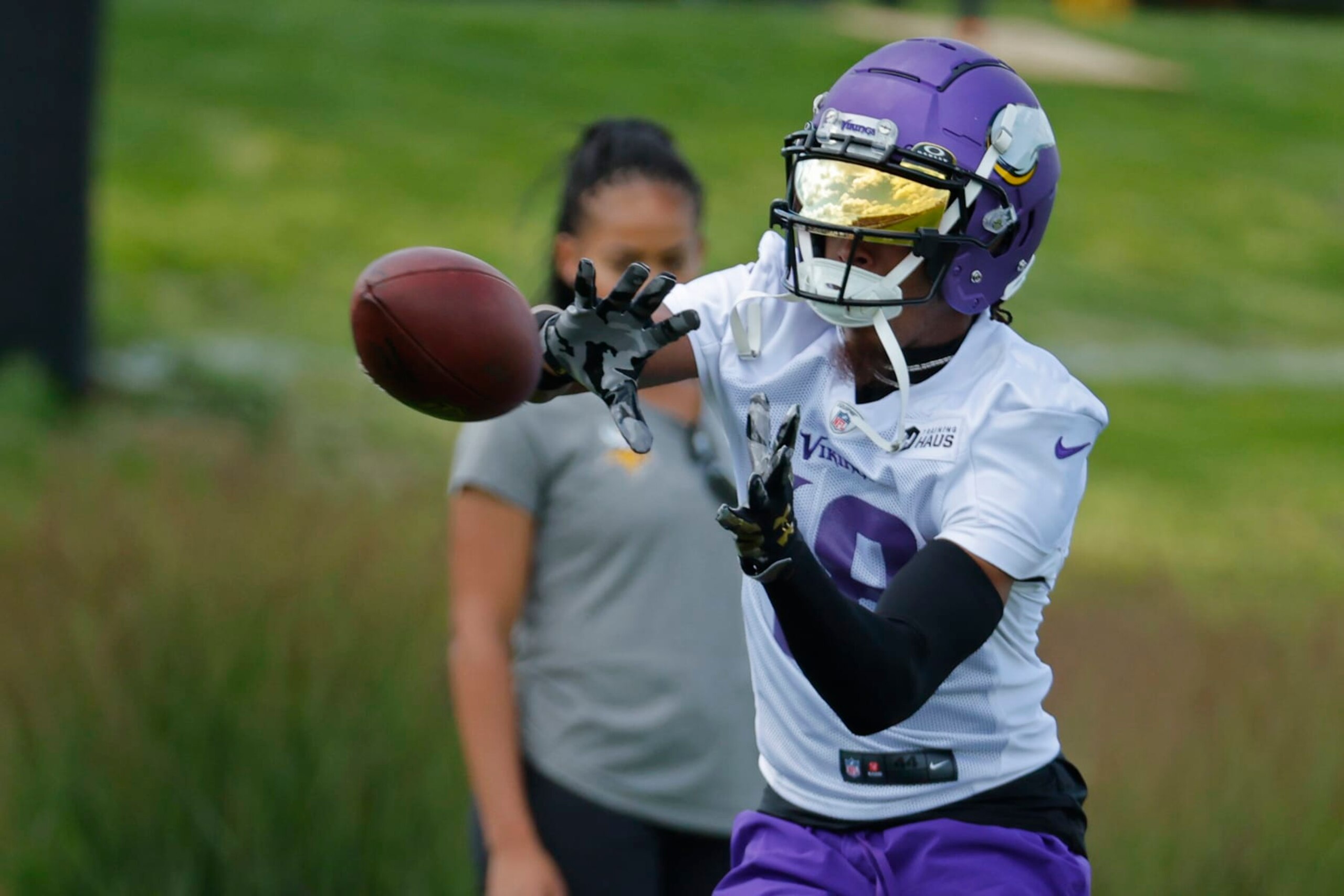 Minnesota Vikings wide receiver Justin Jefferson catches a pass in drills during an NFL football practice Saturday, July 29, 2023, in Eagan, Minn. (AP Photo/Bruce Kluckhohn)