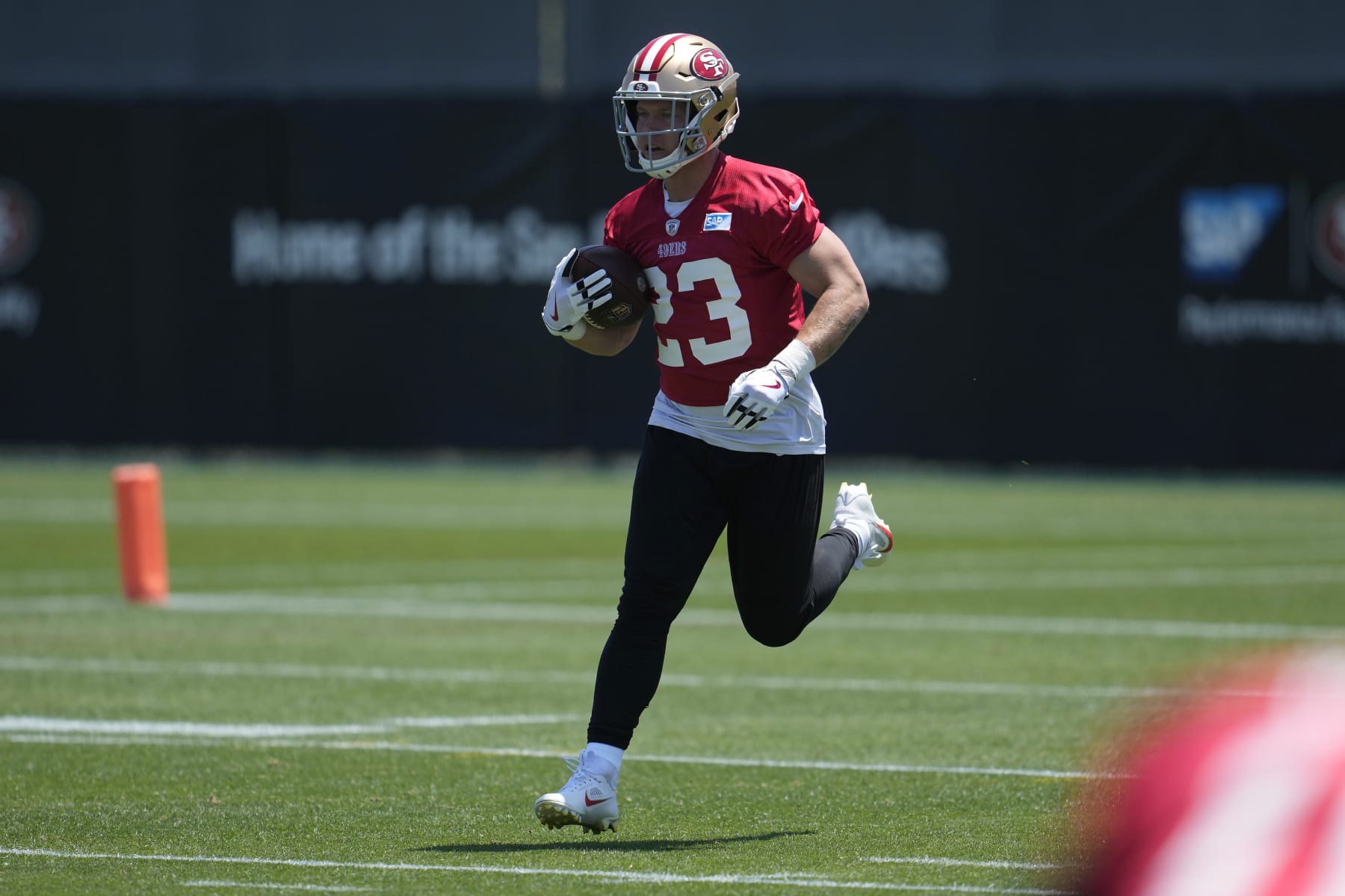 San Francisco 49ers running back Christian McCaffrey takes part in an NFL football practice in Santa Clara, Calif., Wednesday, May 31, 2023. (AP Photo/Jeff Chiu)