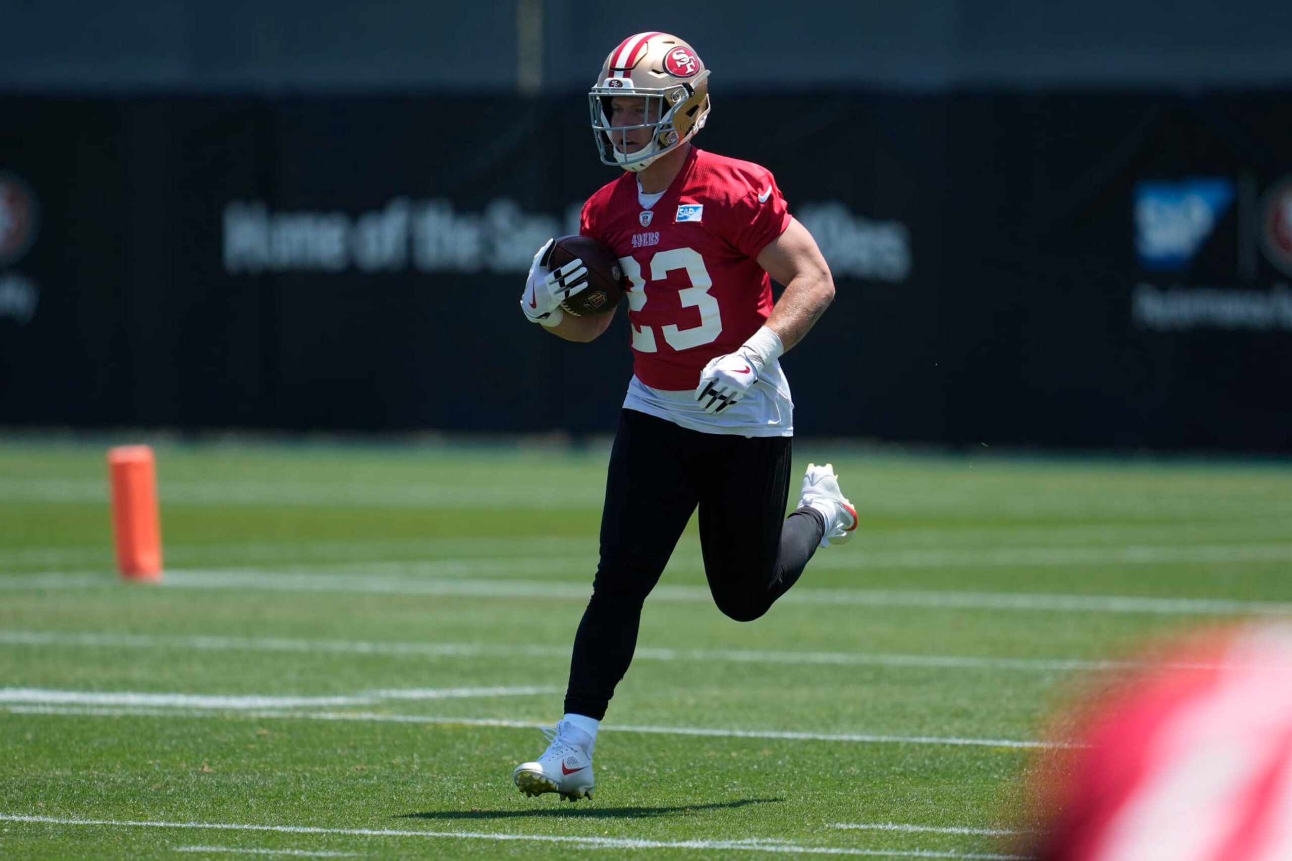 San Francisco 49ers running back Christian McCaffrey takes part in an NFL football practice in Santa Clara, Calif., Wednesday, May 31, 2023. (AP Photo/Jeff Chiu)