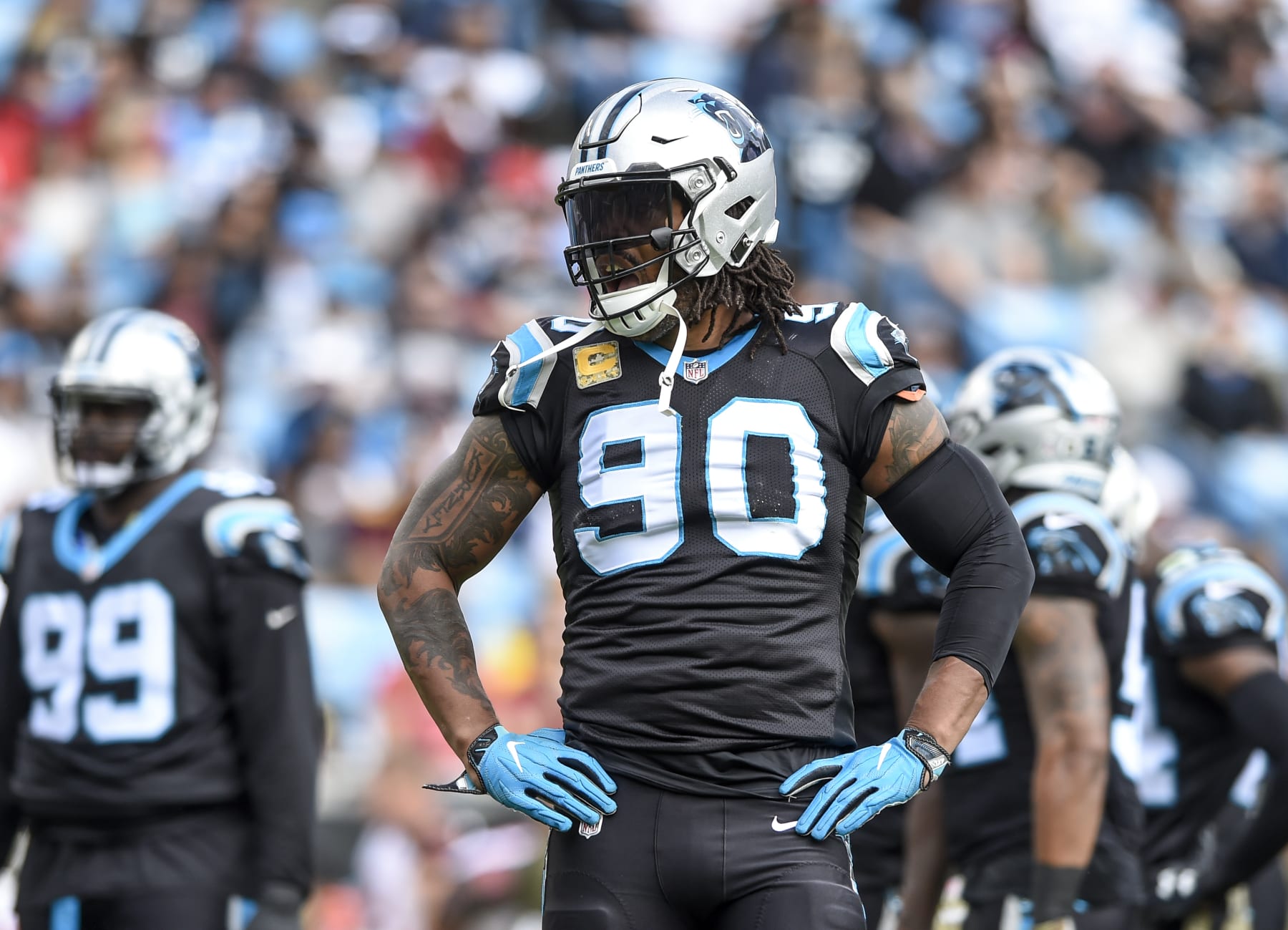 Carolina Panthers defensive end Julius Peppers (90) waits for play to resume during an NFL football game against the Tampa Bay Buccaneers in Charlotte, N.C., Sunday, Nov. 4, 2018. (AP Photo/Mike McCarn)