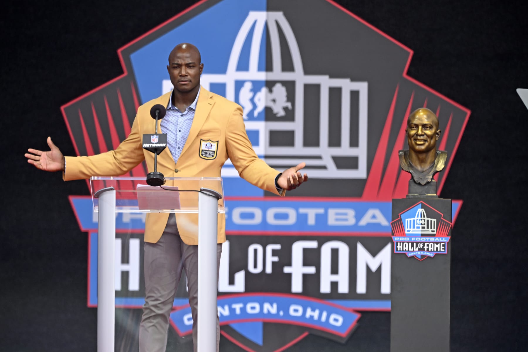 Former NFL player DeMarcus Ware speaks during his induction into the Pro Football Hall of Fame Class in Canton, Ohio, Saturday, Aug. 5, 2023. (AP Photo/David Richard)