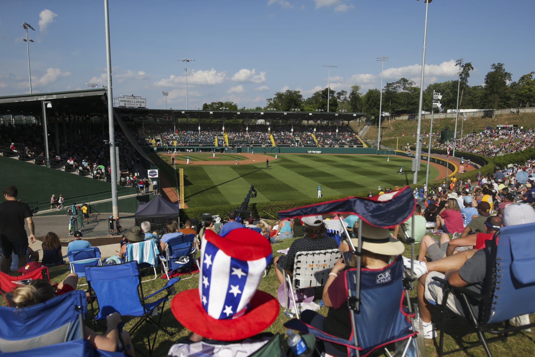 SOUTH WILLIAMSPORT, PENNSYLVANIA - AUGUST 28: Fans watch the Little League World Series Championship game between the West Region team from Honolulu, Hawaii and the Caribbean Region team from Willemstad, Curacao at the Little League International Complex on August 28, 2022 in South Williamsport, Pennsylvania. (Photo by Joshua Bessex/Getty Images)