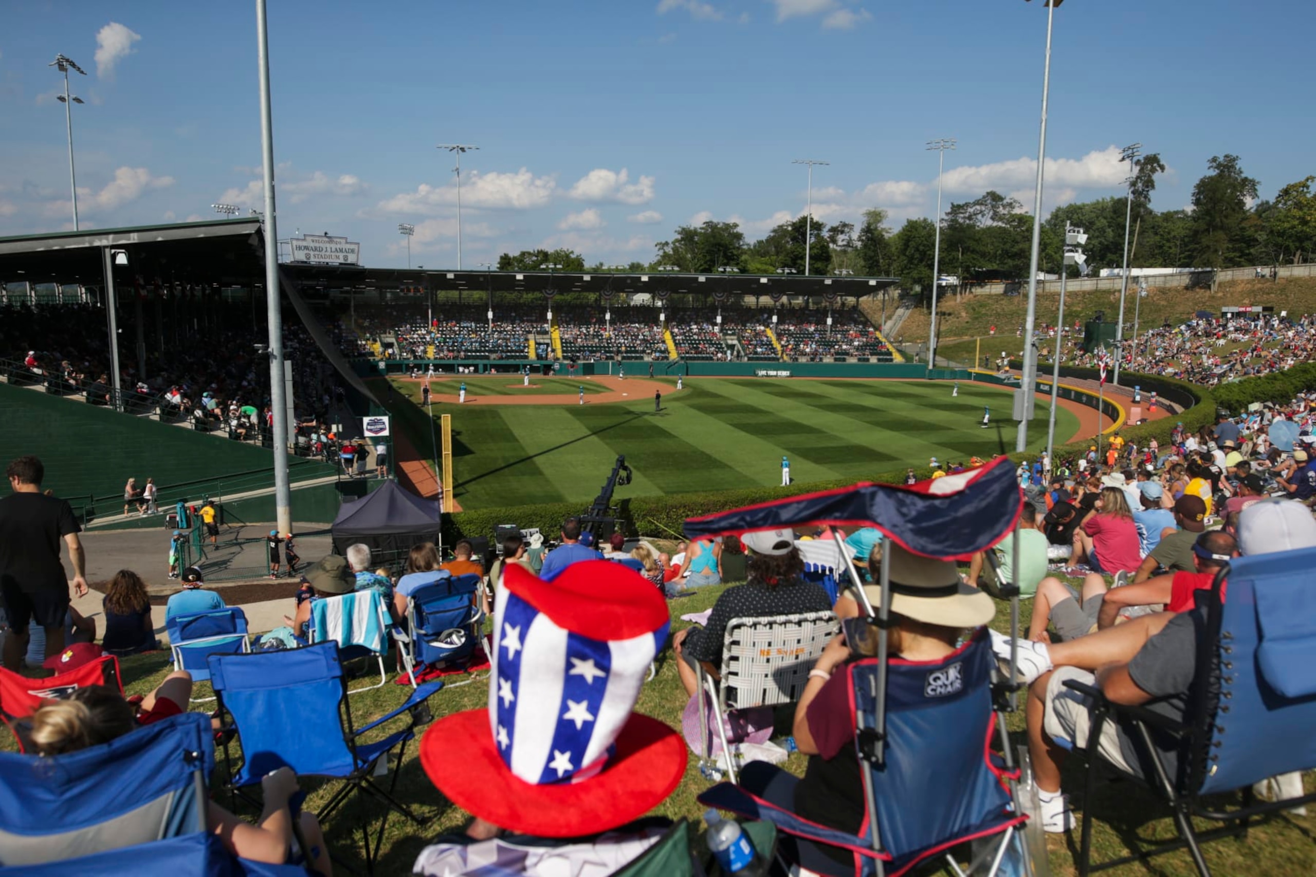 SOUTH WILLIAMSPORT, PENNSYLVANIA - AUGUST 28: Fans watch the Little League World Series Championship game between the West Region team from Honolulu, Hawaii and the Caribbean Region team from Willemstad, Curacao at the Little League International Complex on August 28, 2022 in South Williamsport, Pennsylvania. (Photo by Joshua Bessex/Getty Images) SOUTH WILLIAMSPORT, PENNSYLVANIA - AUGUST 28: Fans watch the Little League World Series Championship game between the West Region team from Honolulu, Hawaii and the Caribbean Region team from Willemstad, Curacao at the Little League International Complex on August 28, 2022 in South Williamsport, Pennsylvania. (Photo by Joshua Bessex/Getty Images)