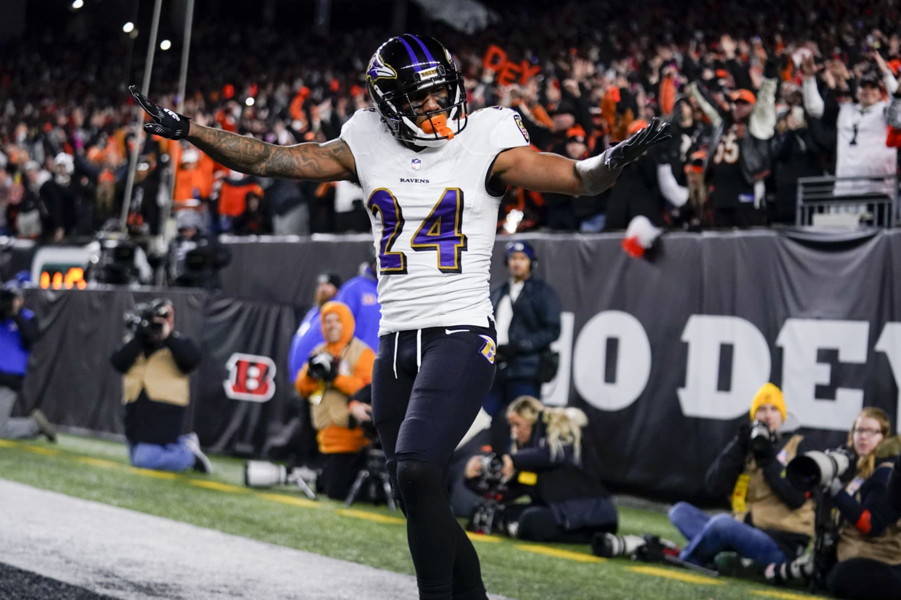 Baltimore Ravens cornerback Marcus Peters (24) reacts after breaking up a pass during a wild-card playoff NFL football game against the Cincinnati Bengals, Monday, Jan. 16, 2023, in Cincinnati. (AP Photo/Jeff Dean)