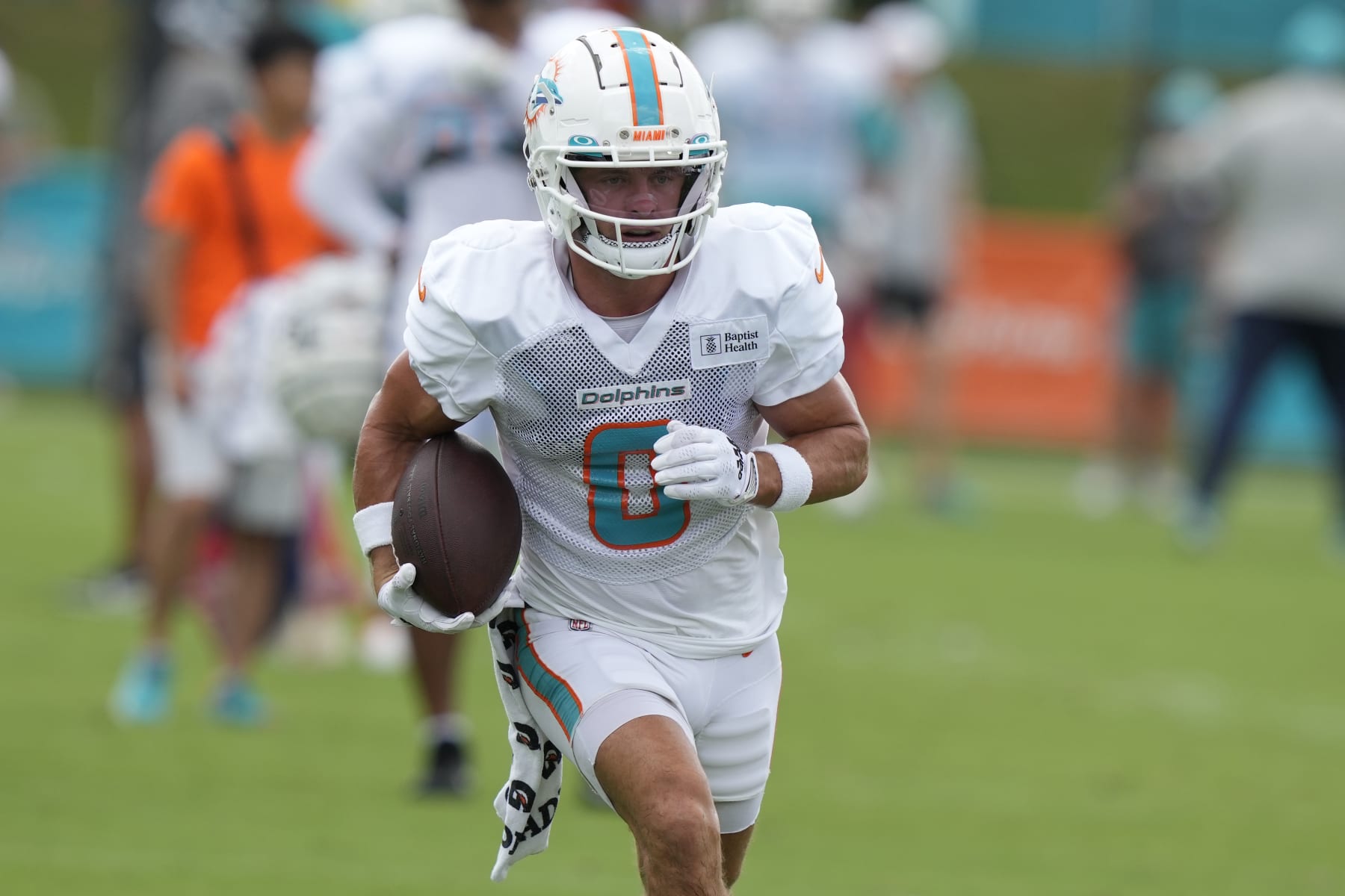 Miami Dolphins wide receiver Braxton Berrios (0) runs drills during practice at the NFL football team's training facility, Tuesday, Aug. 1, 2023, in Miami Gardens, Fla. (AP Photo/Lynne Sladky)