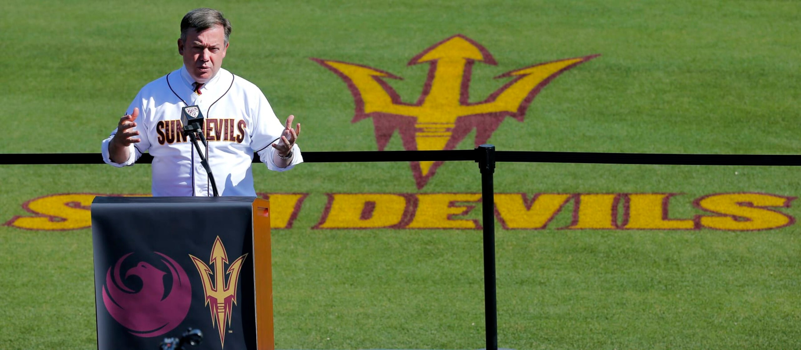 Arizona State Universty President Michael Crow formally announces, Tuesday, April 23, 2013, that Arizona State baseball will begin playing at Phoenix Municipal Stadium at the start of the 2015 season. The stadium is the current spring training home of the Oakland Athletics. (AP Photo/Matt York)