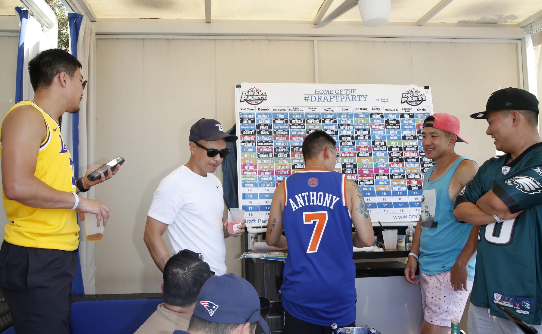 LAS VEGAS, NEVADA - AUGUST 21: Attendees fill out a Fantasy Football Draft Board during a pool party at Sapphire Pool & Day Club on August 21, 2021 in Las Vegas, Nevada. (Photo by Gabe Ginsberg/Getty Images)