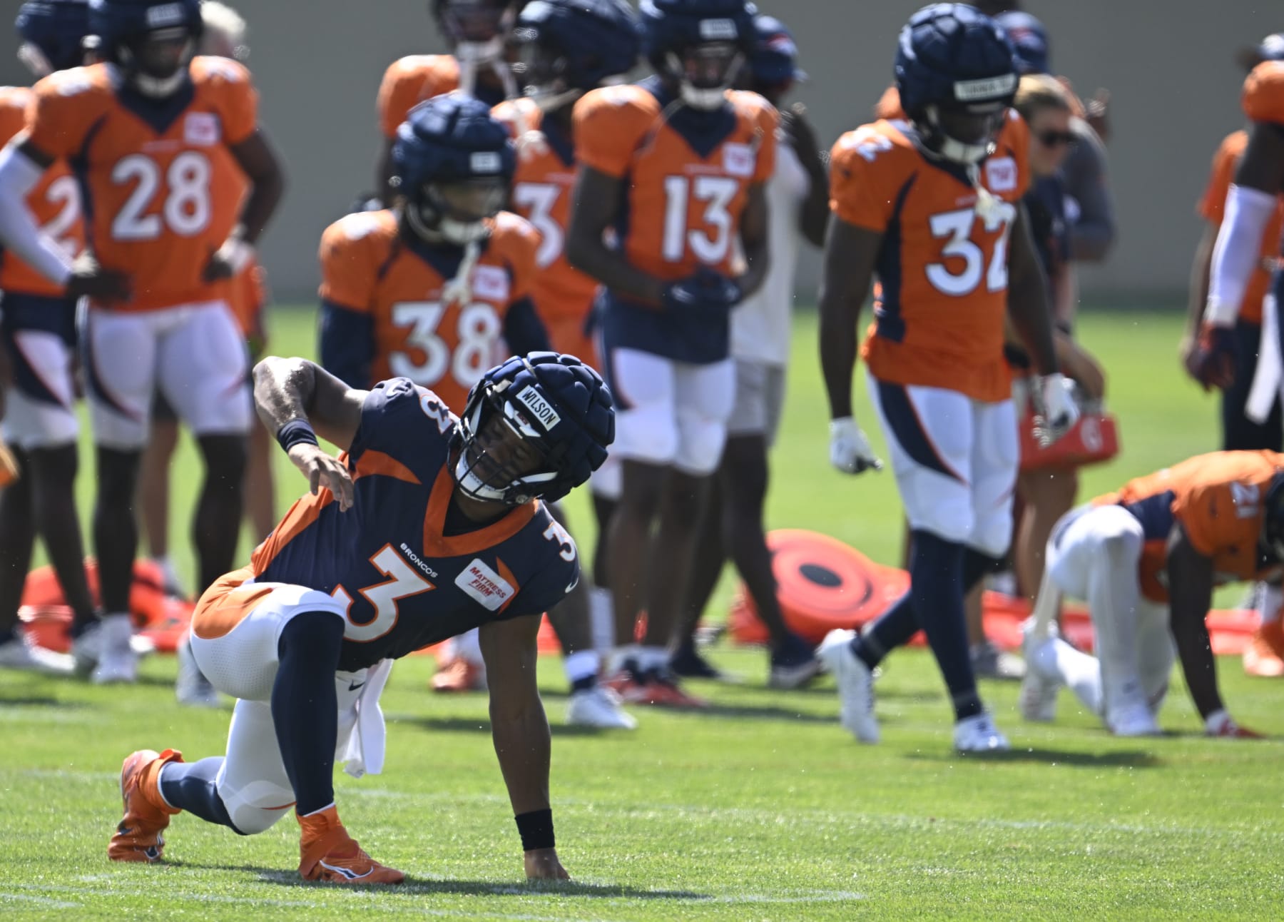 CENTENNIAL, COLORADO - JULY 31: Denver Broncos quarterback Russell Wilson (3) stretches out during the Denver Broncos training camp at Centura Health Training Center on July 31, 2023 in Centennial, Colorado. (Photo by RJ Sangosti/MediaNews Group/The Denver Post via Getty Images)