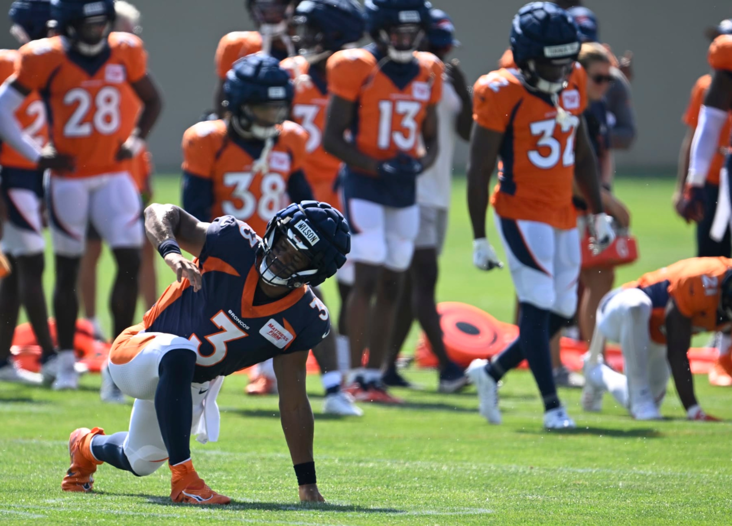 CENTENNIAL, COLORADO - JULY 31: Denver Broncos quarterback Russell Wilson (3) stretches out during the Denver Broncos training camp at Centura Health Training Center on July 31, 2023 in Centennial, Colorado. (Photo by RJ Sangosti/MediaNews Group/The Denver Post via Getty Images)