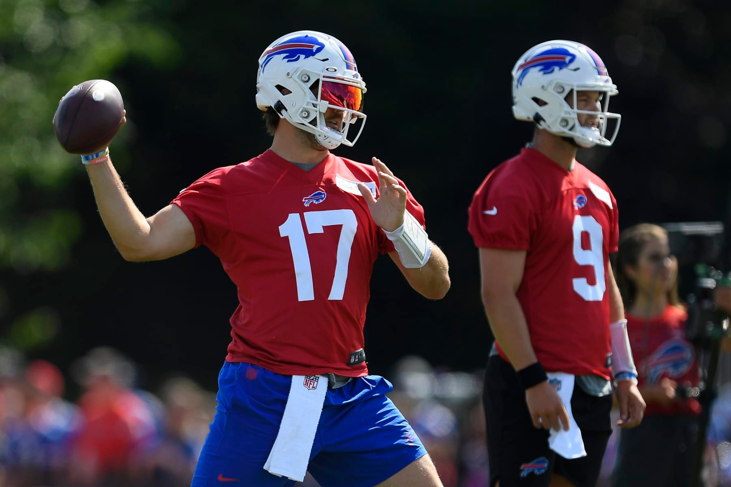 Buffalo Bills quarterback Josh Allen (17) throws a pass during practice at the NFL football team's training camp in Pittsford, N.Y., Sunday, July 30, 2023. (AP Photo/Adrian Kraus)