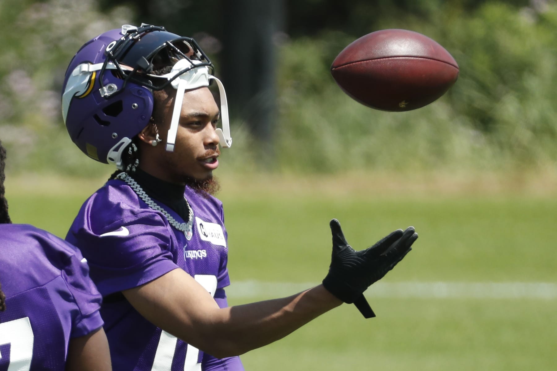 Minnesota Vikings wide receiver Justin Jefferson tosses a ball during an NFL football practice Tuesday, June 13, 2023, in Eagan, Minn.. (AP Photo/Bruce Kluckhohn) Minnesota Vikings wide receiver Justin Jefferson tosses a ball during an NFL football practice Tuesday, June 13, 2023, in Eagan, Minn.. (AP Photo/Bruce Kluckhohn)