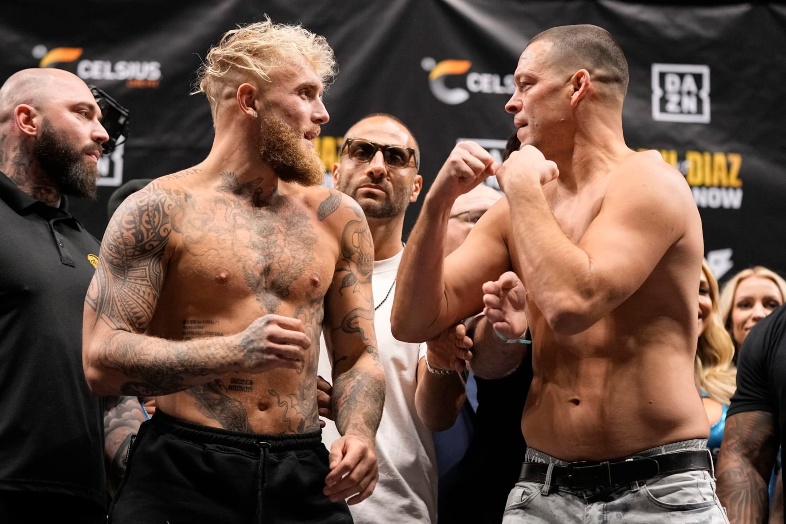Jake Paul (left) and Nate Diaz face off before their boxing match. 