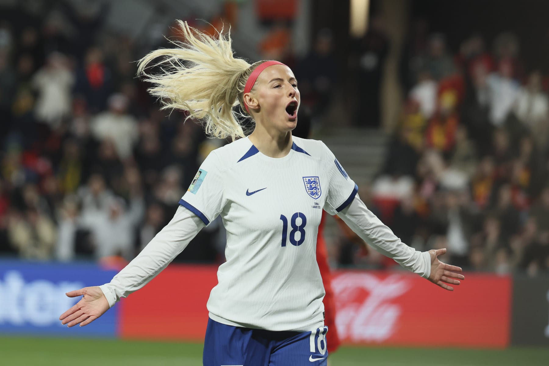 England's Chloe Kelly, celebrates after she scored during the Women's World Cup Group D soccer match between China and England in Adelaide, Australia, Tuesday, Aug. 1, 2023. (AP Photo/James Elsby)