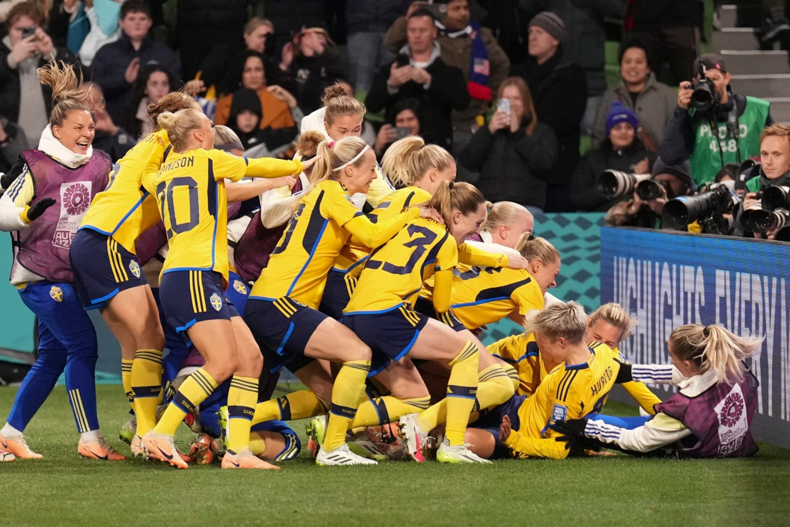 Sweden celebrate after defeating the United States in a penalty shootout in their Women's World Cup round of 16 soccer match in Melbourne, Australia, Sunday, Aug. 6, 2023. (AP Photo/Scott Barbour)