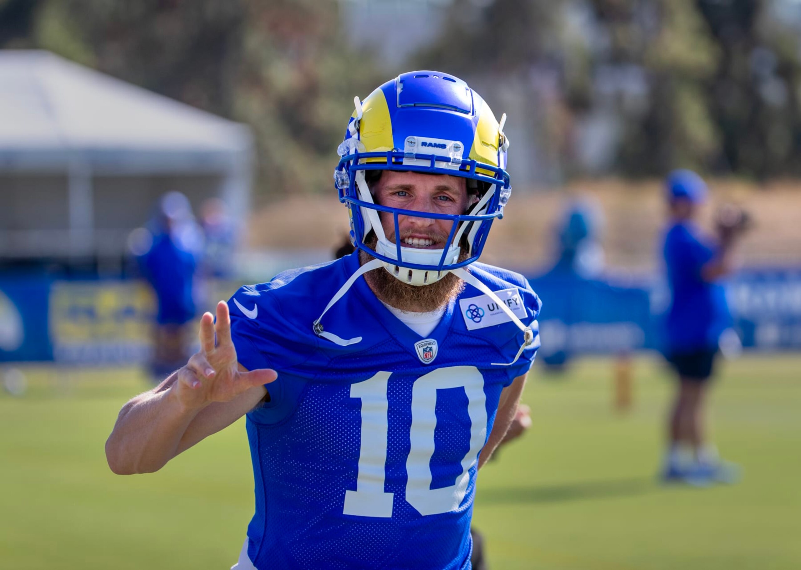 Irvine, CA - July 27:  Rams wide receiver Cooper Kupp waves to fans during Rams training camp at UCI in Irvine Thursday, July 27, 2023.  (Allen J. Schaben / Los Angeles Times via Getty Images)