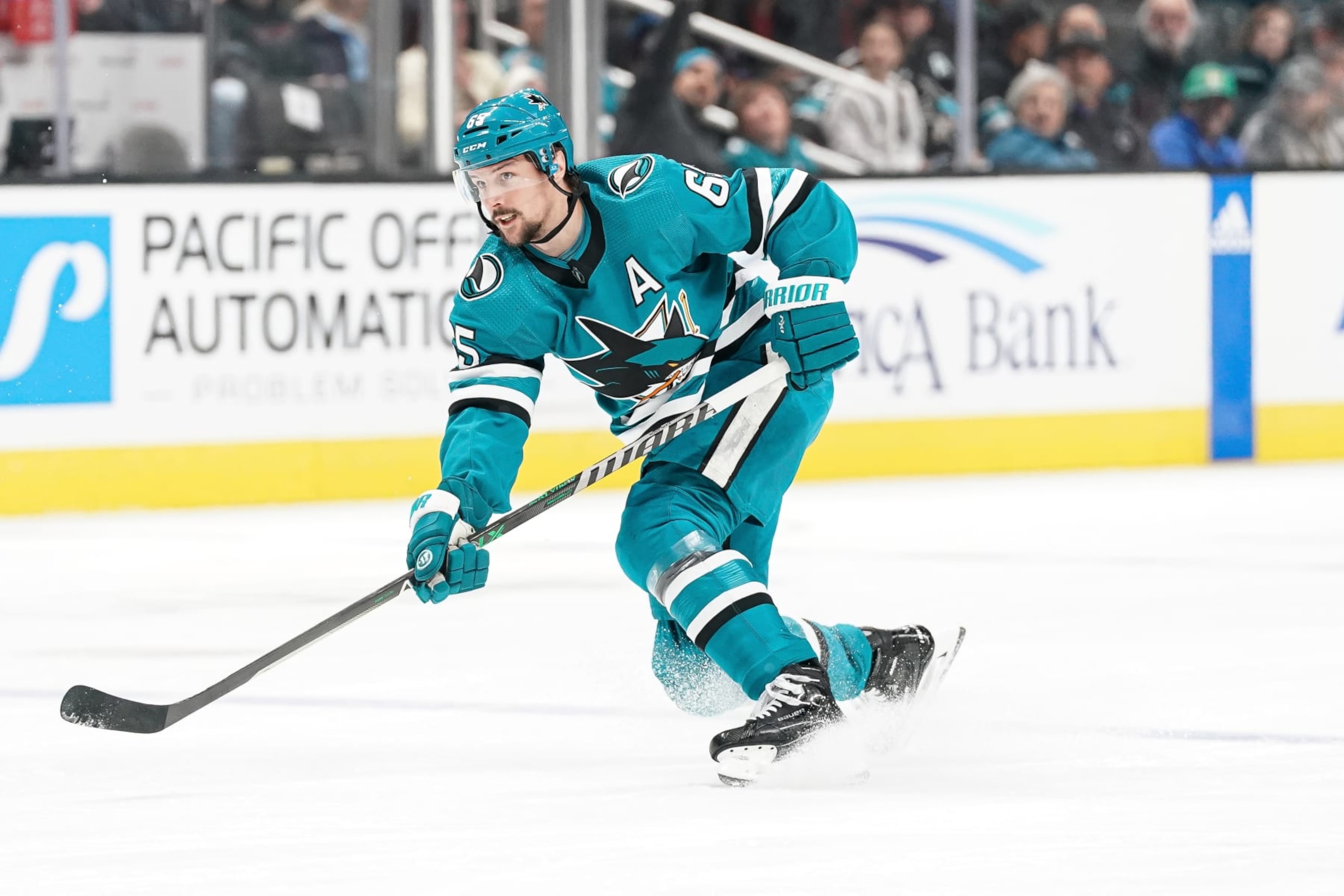 SAN JOSE, CA - MARCH 28: Erik Karlsson #65 of the San Jose Sharks takes a shot on goal in the first period against the Winnipeg Jets at SAP Center on March 28, 2023 in San Jose, California. (Photo by Kavin Mistry/NHLI via Getty Images)