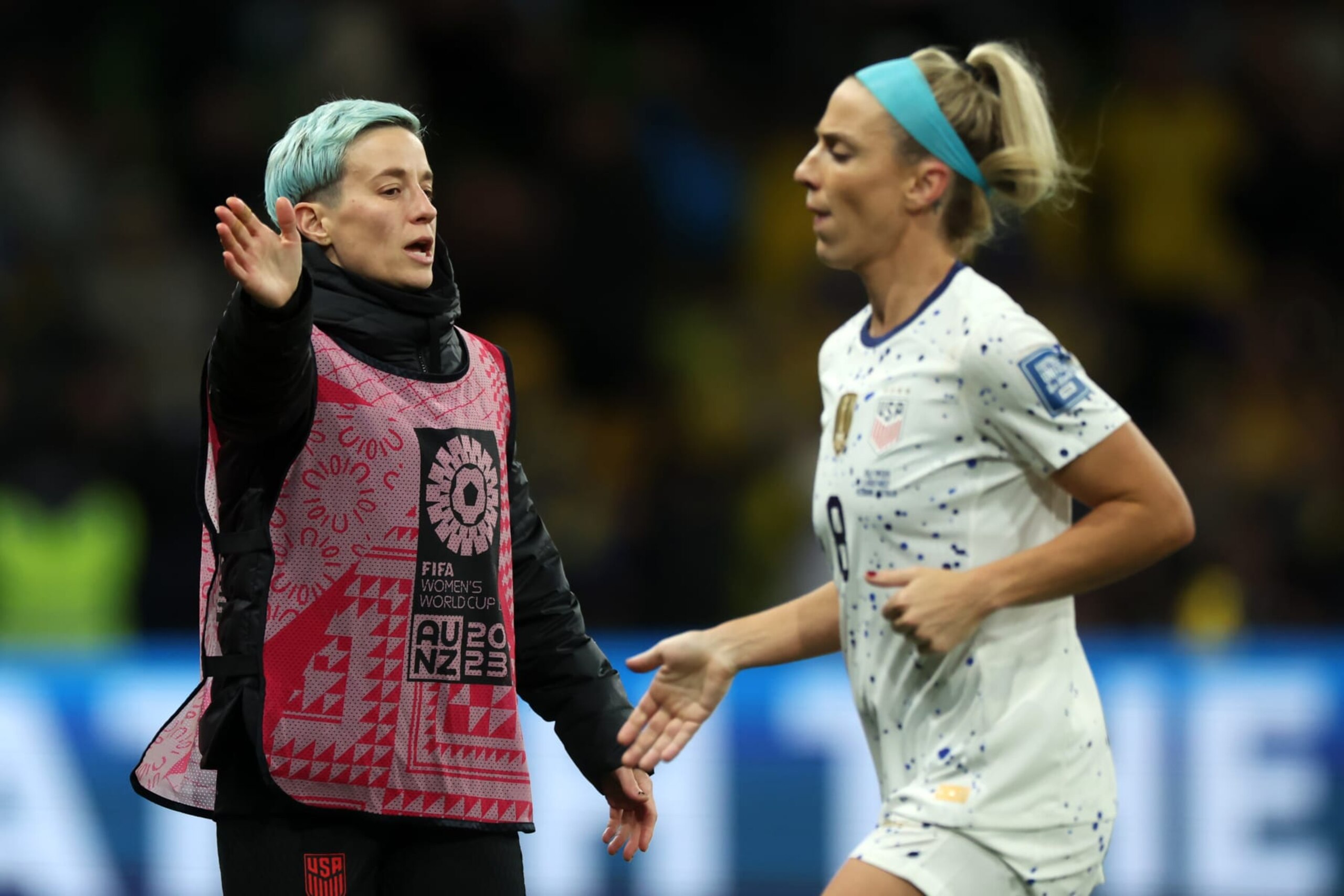 MELBOURNE, AUSTRALIA - AUGUST 06: Megan Rapinoe (L) of USA high fives with Julie Ertz (R) after the first half during the FIFA Women's World Cup Australia & New Zealand 2023 Round of 16 match between Sweden and USA at Melbourne Rectangular Stadium on August 06, 2023 in Melbourne / Naarm, Australia. (Photo by Alex Grimm - FIFA/FIFA via Getty Images) MELBOURNE, AUSTRALIA - AUGUST 06: Megan Rapinoe (L) of USA high fives with Julie Ertz (R) after the first half during the FIFA Women's World Cup Australia & New Zealand 2023 Round of 16 match between Sweden and USA at Melbourne Rectangular Stadium on August 06, 2023 in Melbourne / Naarm, Australia. (Photo by Alex Grimm - FIFA/FIFA via Getty Images)