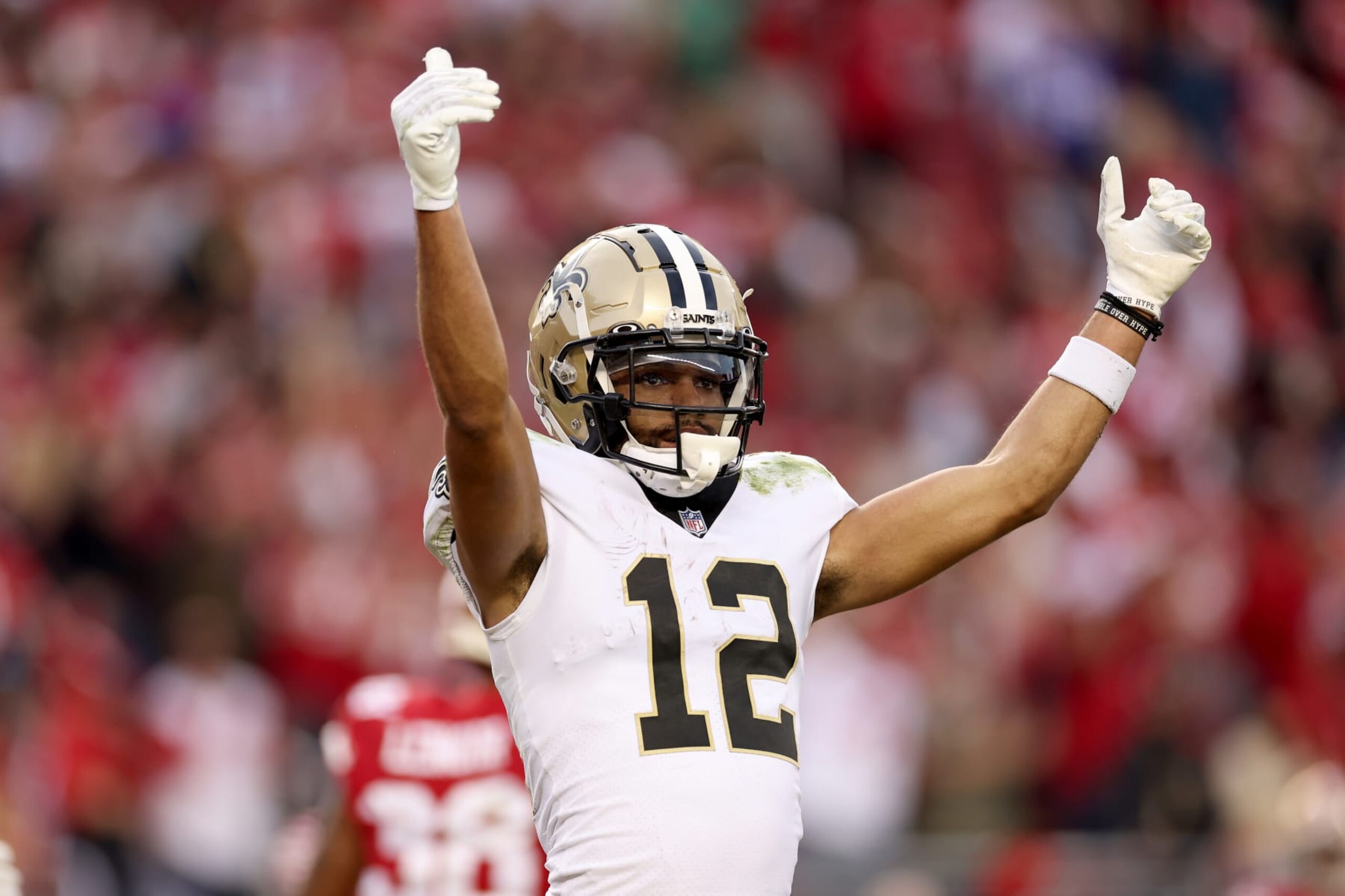 SANTA CLARA, CALIFORNIA - NOVEMBER 27: Chris Olave #12 of the New Orleans Saints reacts during their game against the San Francisco 49ers at Levi's Stadium on November 27, 2022 in Santa Clara, California. (Photo by Ezra Shaw/Getty Images) SANTA CLARA, CALIFORNIA - NOVEMBER 27: Chris Olave #12 of the New Orleans Saints reacts during their game against the San Francisco 49ers at Levi's Stadium on November 27, 2022 in Santa Clara, California. (Photo by Ezra Shaw/Getty Images)