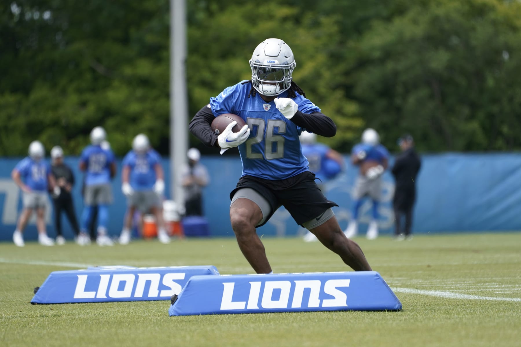 Detroit Lions running back Jahmyr Gibbs runs a drill during an NFL football practice in Allen Park, Mich., Monday, June 12, 2023. (AP Photo/Paul Sancya)