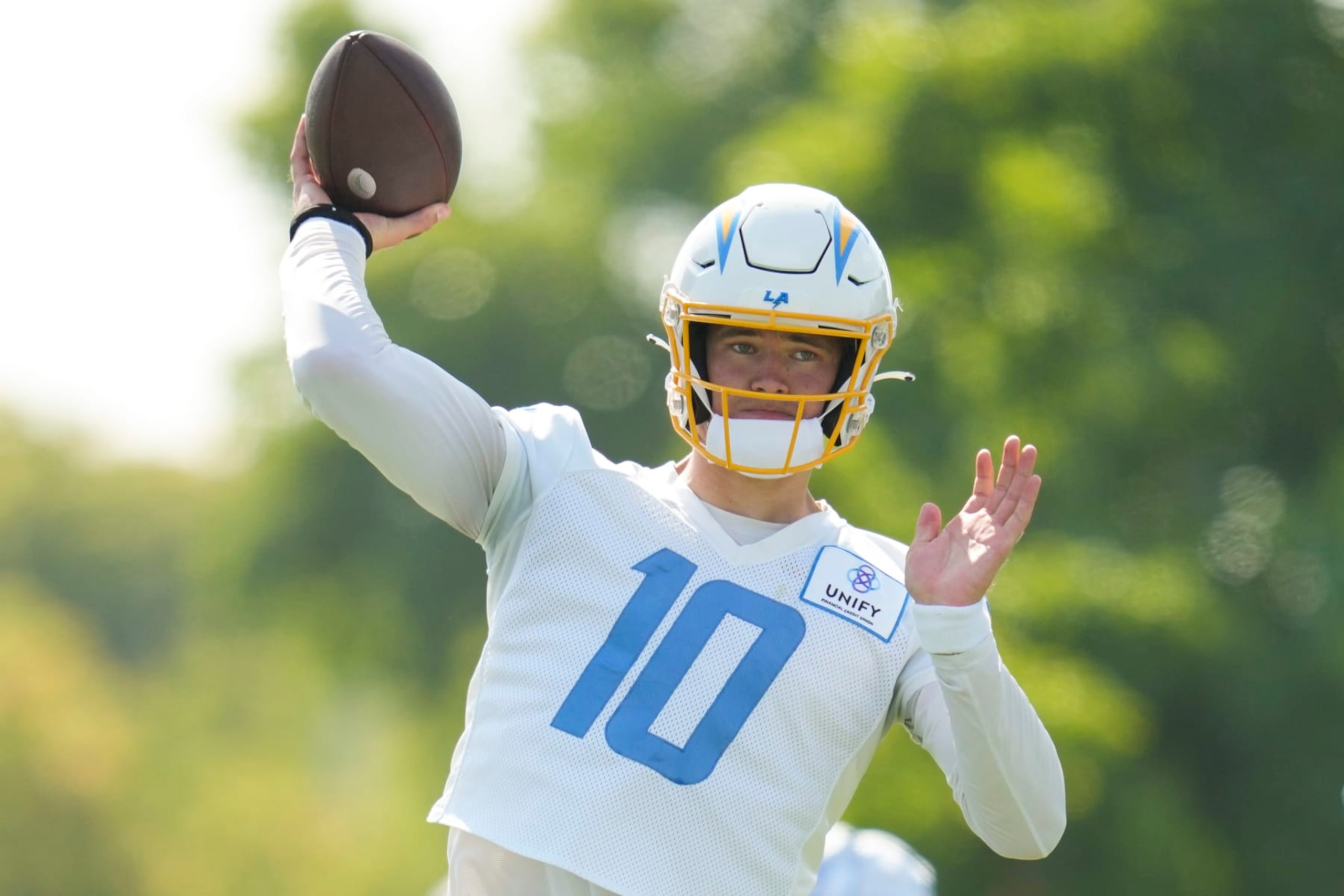 Los Angeles Chargers quarterback Justin Herbert (10) participates in a drill during the NFL football team's training camp, Saturday, July 29, 2023, in Costa Mesa, Calif. (AP Photo/Ashley Landis) Los Angeles Chargers quarterback Justin Herbert (10) participates in a drill during the NFL football team's training camp, Saturday, July 29, 2023, in Costa Mesa, Calif. (AP Photo/Ashley Landis)