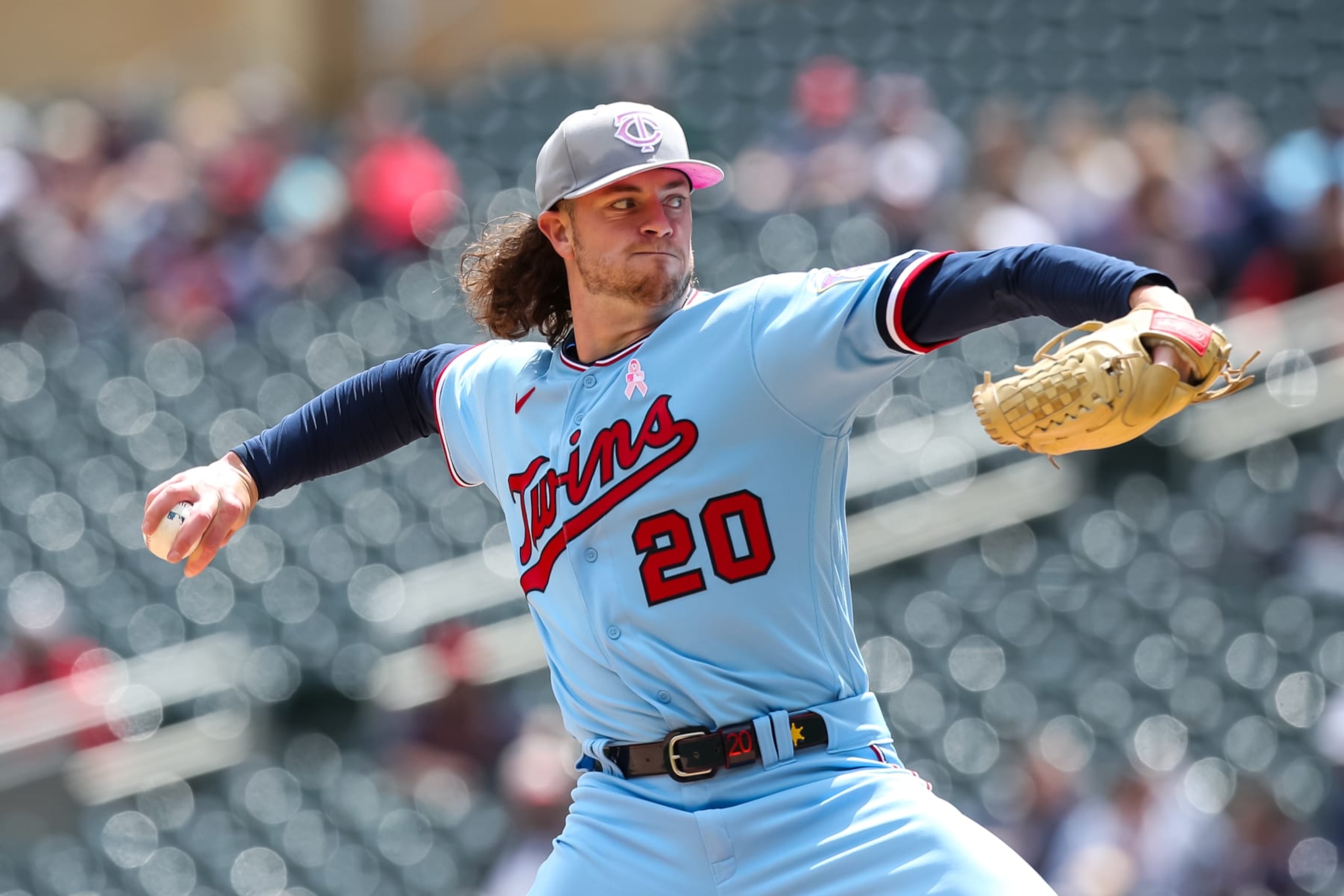 MINNEAPOLIS, MN - MAY 08: Chris Paddack #20 of the Minnesota Twins delivers a pitch against the Oakland Athletics in the first inning at Target Field on May 8, 2022 in Minneapolis, Minnesota. Teams across the league are wearing pink today in honor of Mother's Day. (Photo by David Berding/Getty Images)