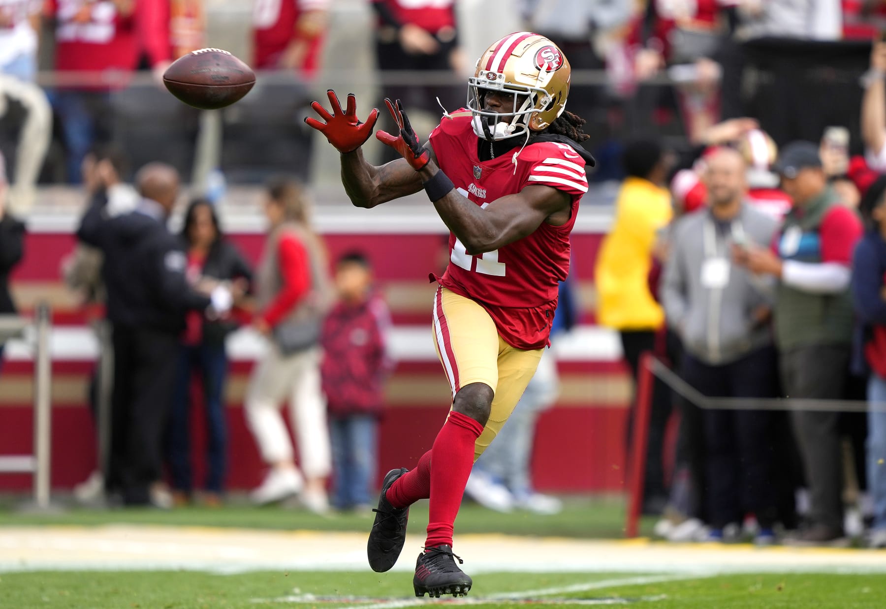 SANTA CLARA, CALIFORNIA - JANUARY 08: Brandon Aiyuk #11 of the San Francisco 49ers warms up during pregame warm ups prior to the start of the game against the Arizona Cardinals at Levi's Stadium on January 08, 2023 in Santa Clara, California. (Photo by Thearon W. Henderson/Getty Images)