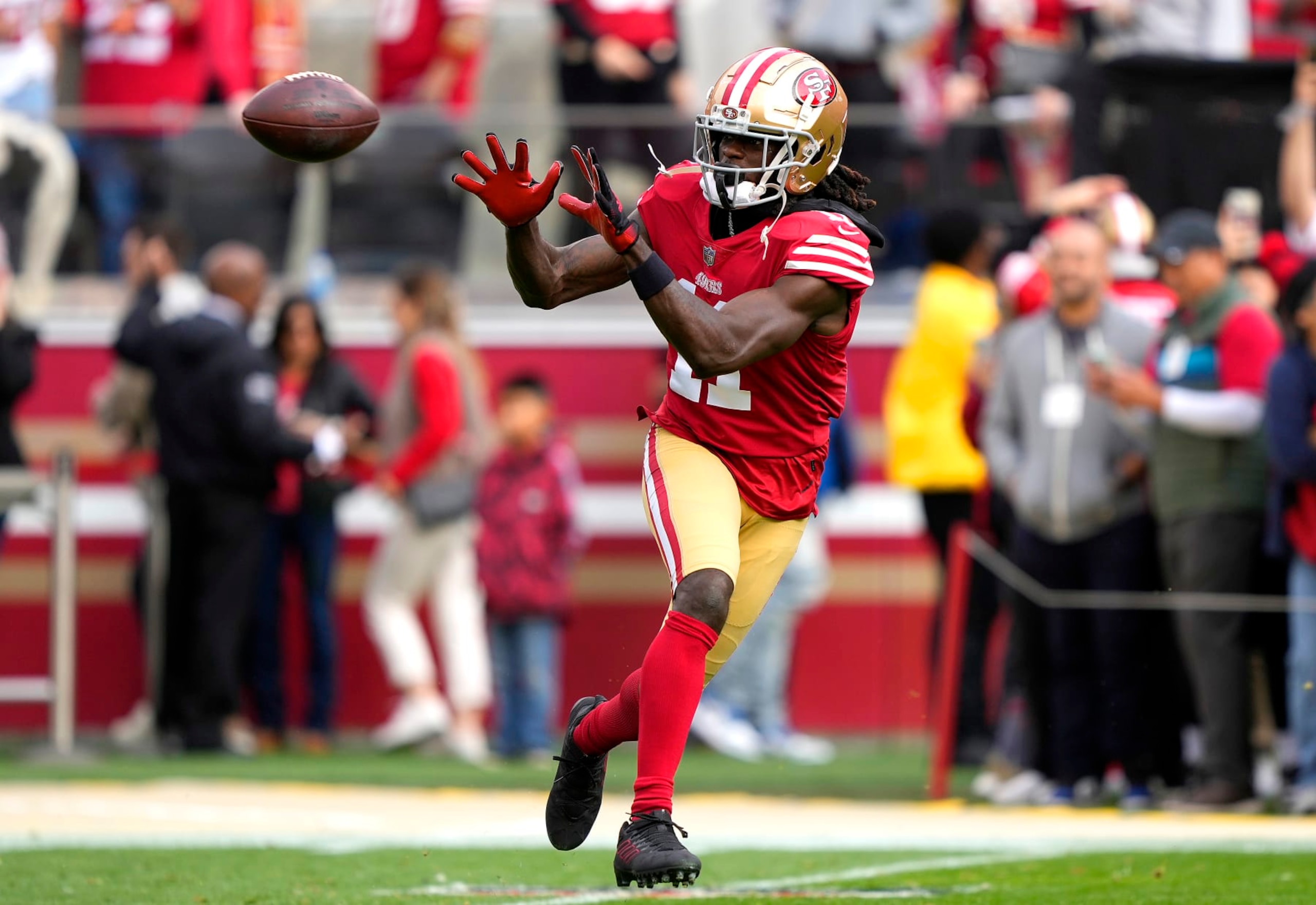 SANTA CLARA, CALIFORNIA - JANUARY 08: Brandon Aiyuk #11 of the San Francisco 49ers warms up during pregame warm ups prior to the start of the game against the Arizona Cardinals at Levi's Stadium on January 08, 2023 in Santa Clara, California. (Photo by Thearon W. Henderson/Getty Images)