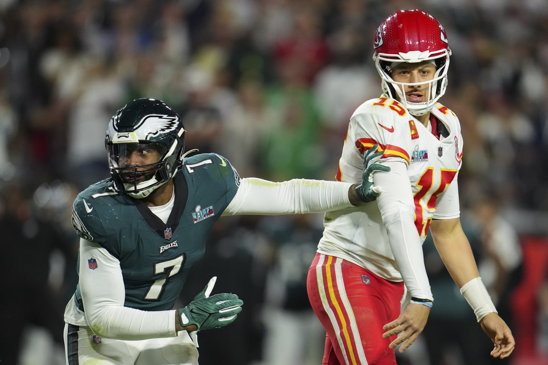GLENDALE, AZ - FEBRUARY 12: Haason Reddick #7 of the Philadelphia Eagles pushes Patrick Mahomes #15 of the Kansas City Chiefs after Super Bowl LVII at State Farm Stadium on February 12, 2023 in Glendale, Arizona. The Chiefs defeated the Eagles 38-35. (Photo by Cooper Neill/Getty Images)