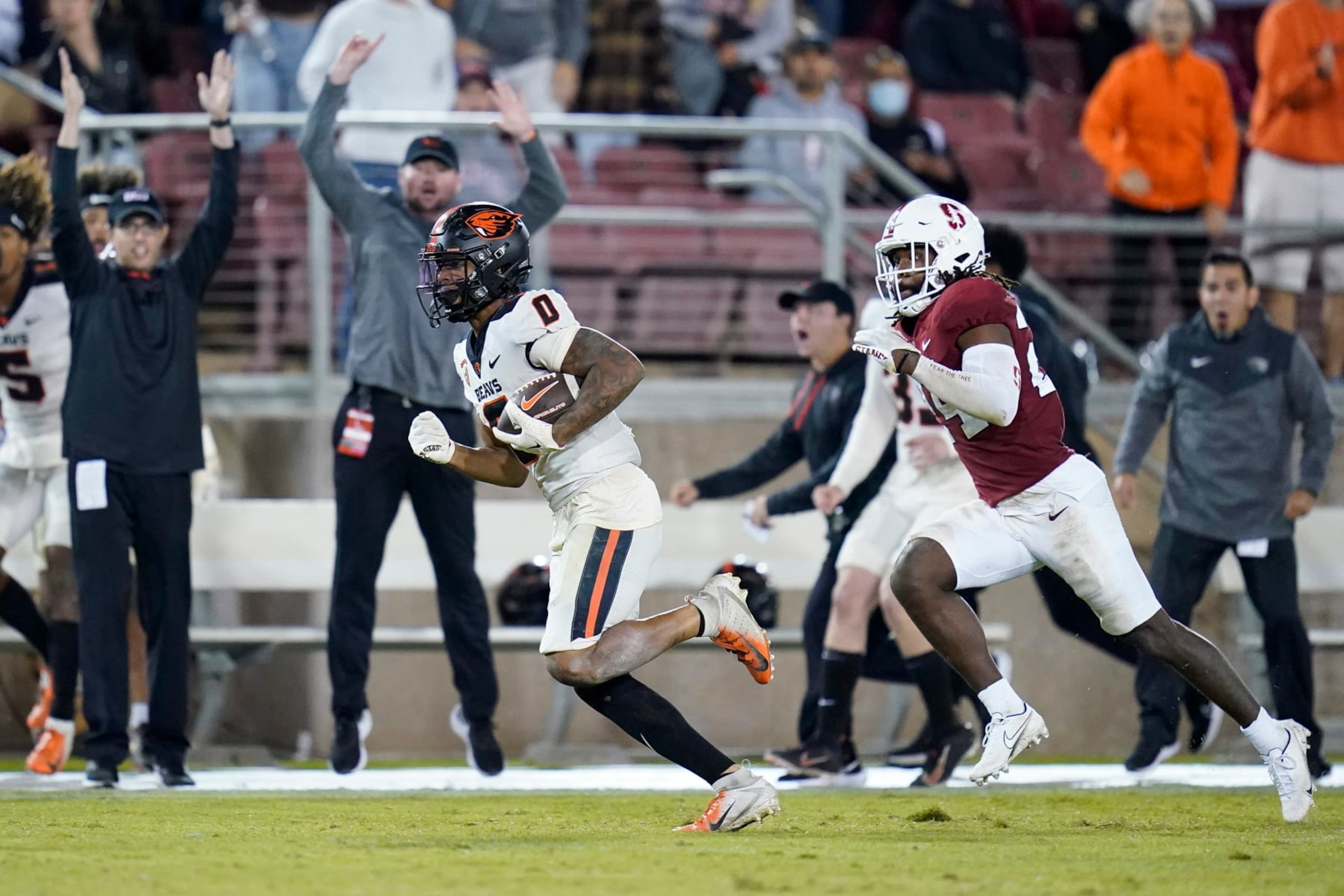 Oregon State wide receiver Tre'Shaun Harrison (0) runs after a catch for a 56-yard touchdown against Stanford during the second half of an NCAA college football game in Stanford, Calif., Saturday, Oct. 8, 2022. Oregon State won 28-27. (AP Photo/Godofredo A. Vásquez) Oregon State wide receiver Tre'Shaun Harrison (0) runs after a catch for a 56-yard touchdown against Stanford during the second half of an NCAA college football game in Stanford, Calif., Saturday, Oct. 8, 2022. Oregon State won 28-27. (AP Photo/Godofredo A. Vásquez)