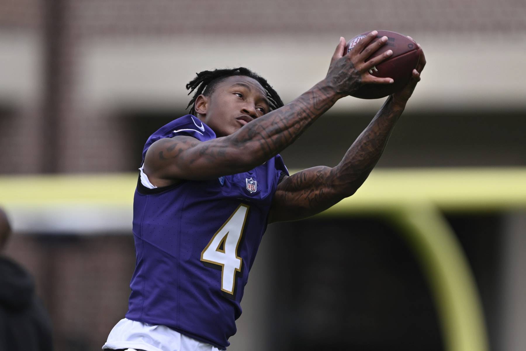 Baltimore Ravens wide receiver Zay Flowers works out during NFL football training camp practice Wednesday, July 26, 2023, in Owings Mills, Md. (AP Photo/Gail Burton)