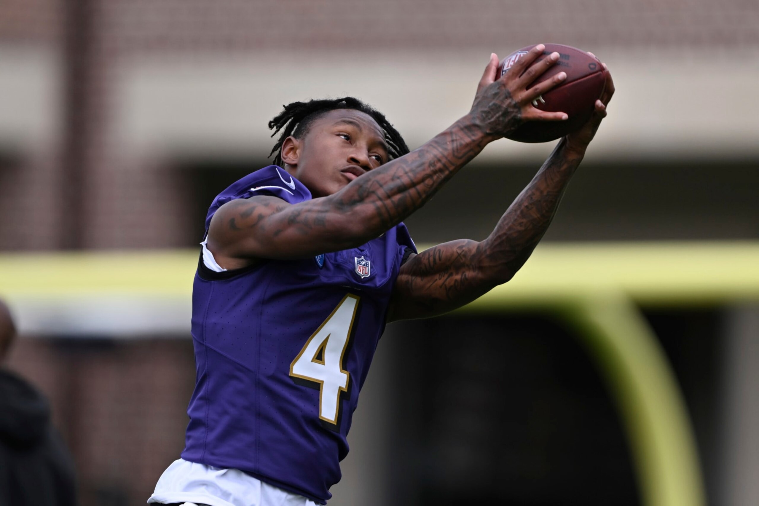 Baltimore Ravens wide receiver Zay Flowers works out during NFL football training camp practice Wednesday, July 26, 2023, in Owings Mills, Md. (AP Photo/Gail Burton)