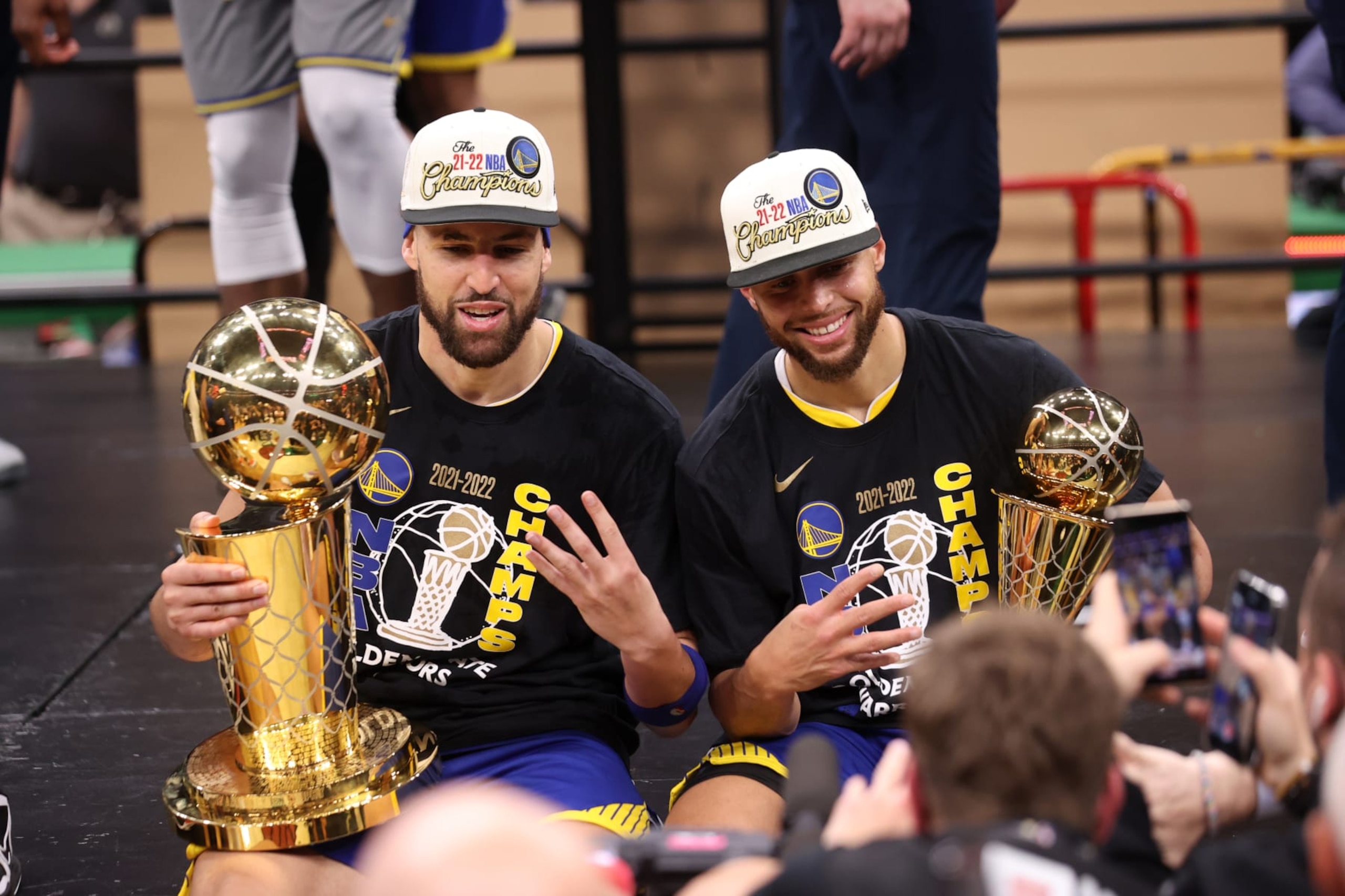 BOSTON, MA - JUNE 16: Klay Thompson #11 and Stephen Curry #30 of the Golden State Warriors pose for a photo with The Larry OBrien Trophy and The Bill Russell NBA Finals MVP Award after Game Six of the 2022 NBA Finals on June 16, 2022 at TD Garden in Boston, Massachusetts. NOTE TO USER: User expressly acknowledges and agrees that, by downloading and or using this photograph, user is consenting to the terms and conditions of Getty Images License Agreement. Mandatory Copyright Notice: Copyright 2022 NBAE (Photo by Joe Murphy/NBAE via Getty Images)