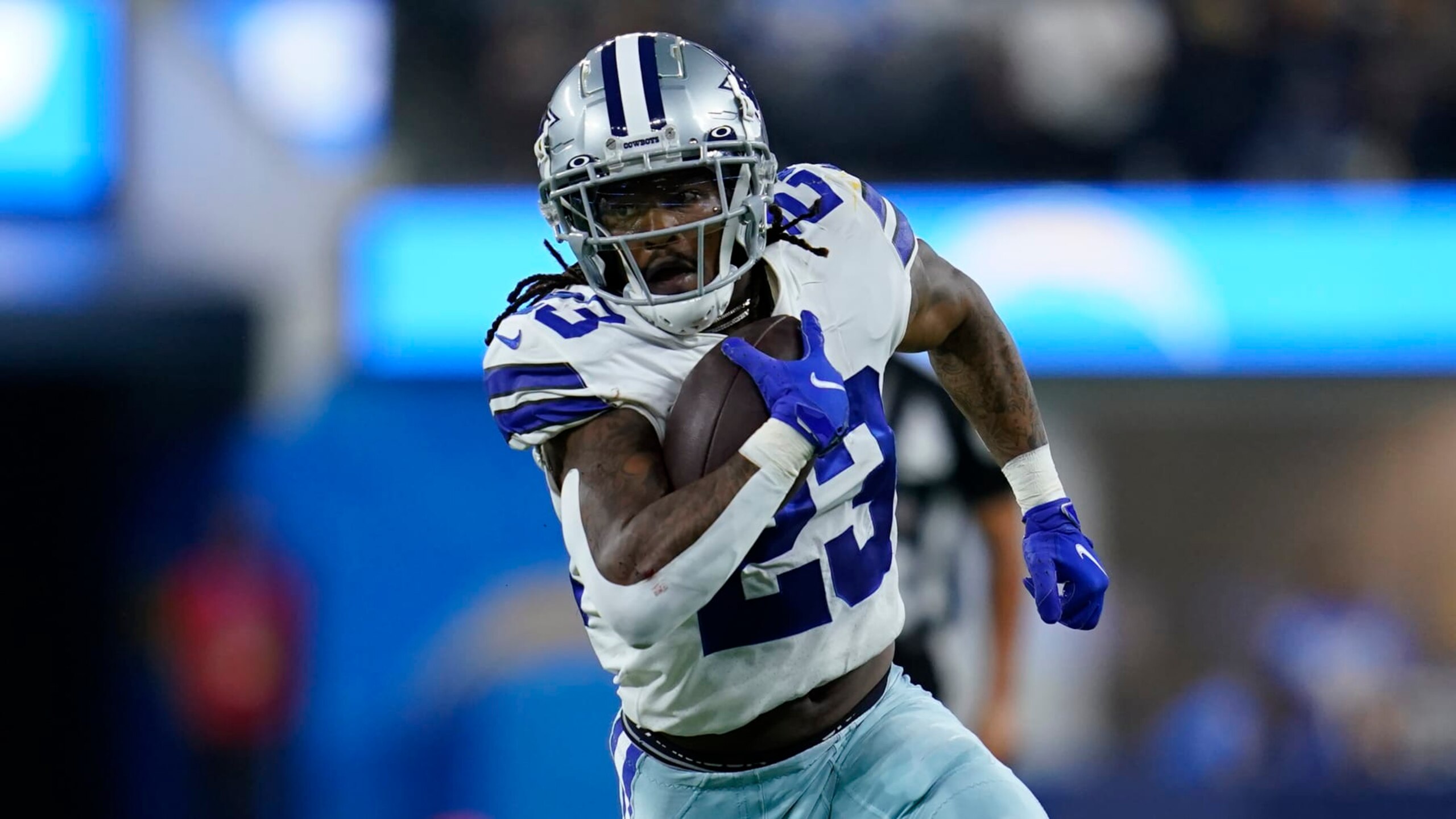 Dallas Cowboys running back Rico Dowdle (23) runs the ball during an NFL football game against the Los Angeles Chargers Wednesday, Aug. 24, 2022, in Inglewood, Calif. (AP Photo/Ashley Landis)