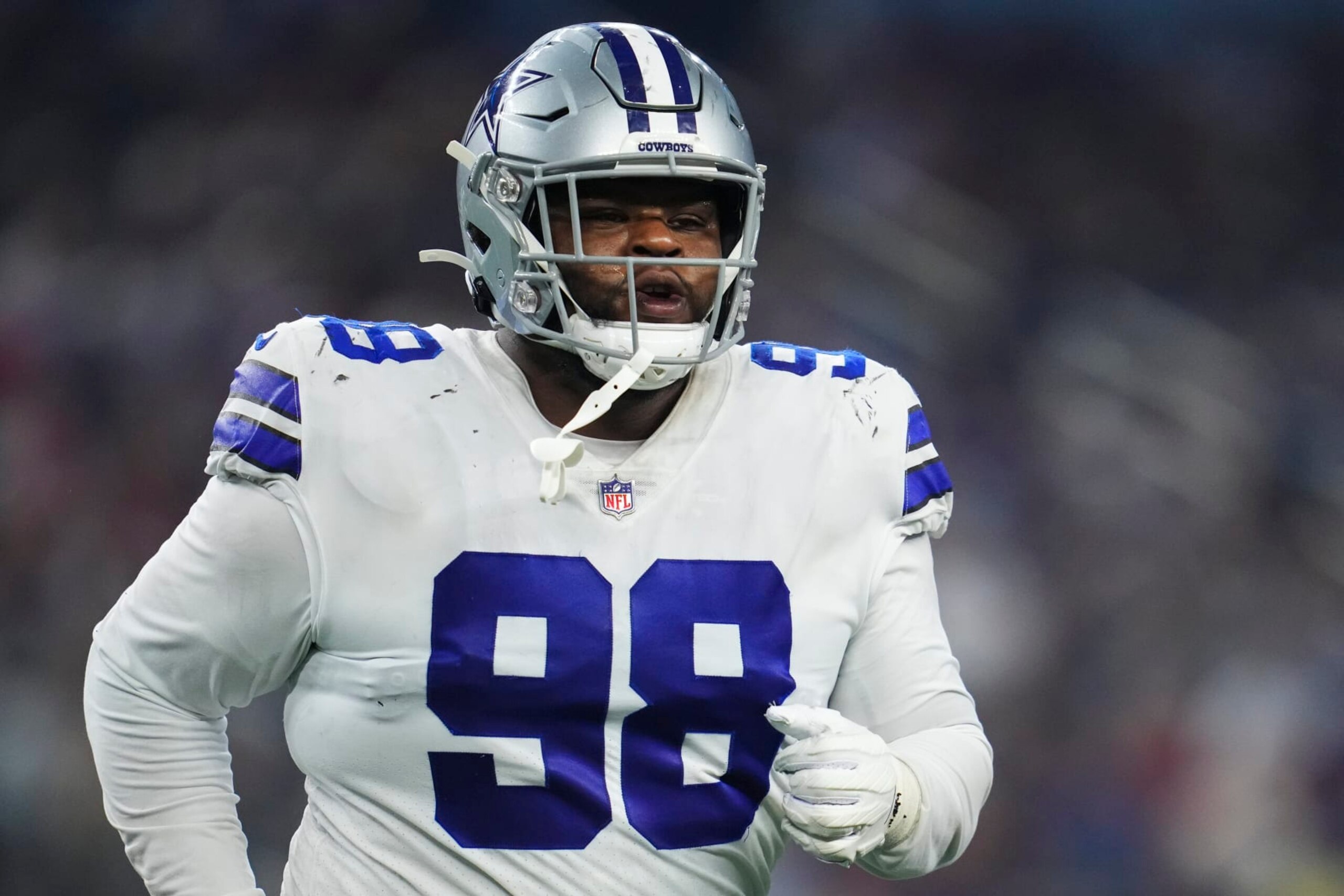 ARLINGTON, TX - SEPTEMBER 11: Quinton Bohanna #98 of the Dallas Cowboys runs off of the field against the Tampa Bay Buccaneers at AT&T Stadium on September 11, 2022 in Arlington, TX. (Photo by Cooper Neill/Getty Images)