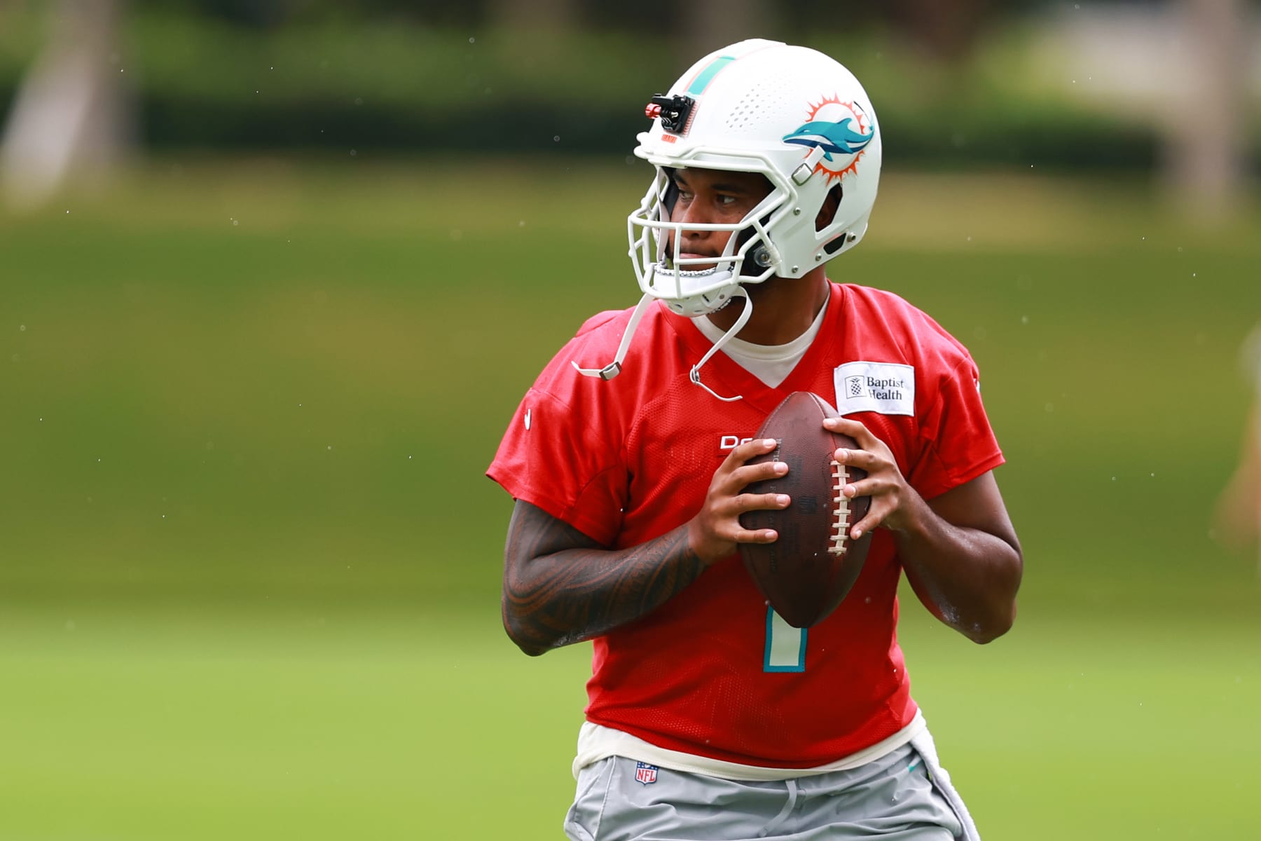 MIAMI GARDENS, FLORIDA - JULY 26: Tua Tagovailoa #1 of the Miami Dolphins takes part in a drill during training camp at Baptist Health Training Complex on July 26, 2023 in Miami Gardens, Florida. (Photo by Megan Briggs/Getty Images)