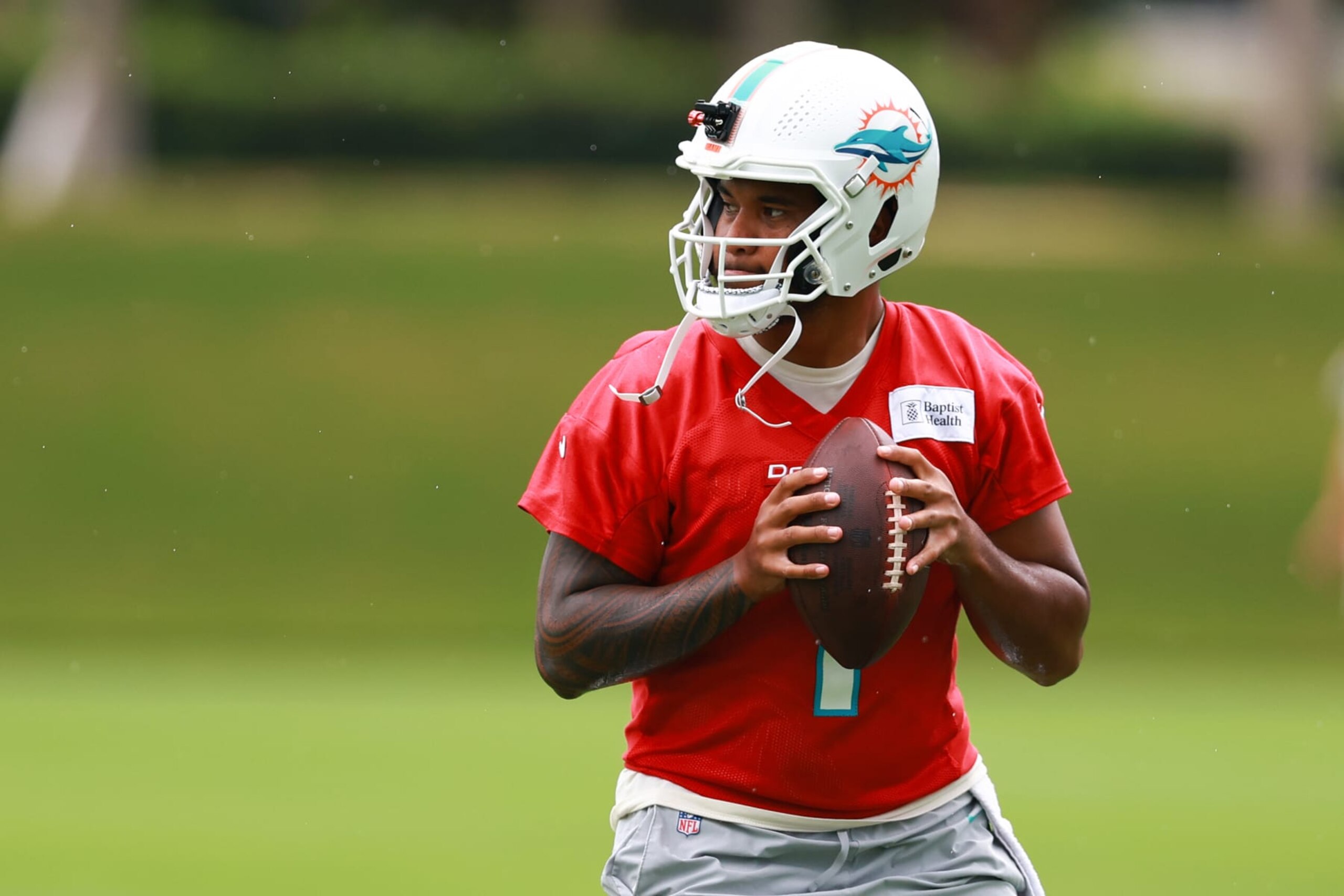 MIAMI GARDENS, FLORIDA - JULY 26: Tua Tagovailoa #1 of the Miami Dolphins takes part in a drill during training camp at Baptist Health Training Complex on July 26, 2023 in Miami Gardens, Florida. (Photo by Megan Briggs/Getty Images)