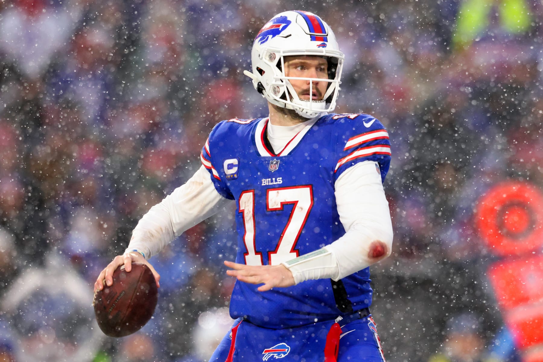 ORCHARD PARK, NEW YORK - JANUARY 22: Josh Allen #17 of the Buffalo Bills throws a pass against the Cincinnati Bengals during the second half in the AFC Divisional Playoff game at Highmark Stadium on January 22, 2023 in Orchard Park, New York. (Photo by Bryan M. Bennett/Getty Images)