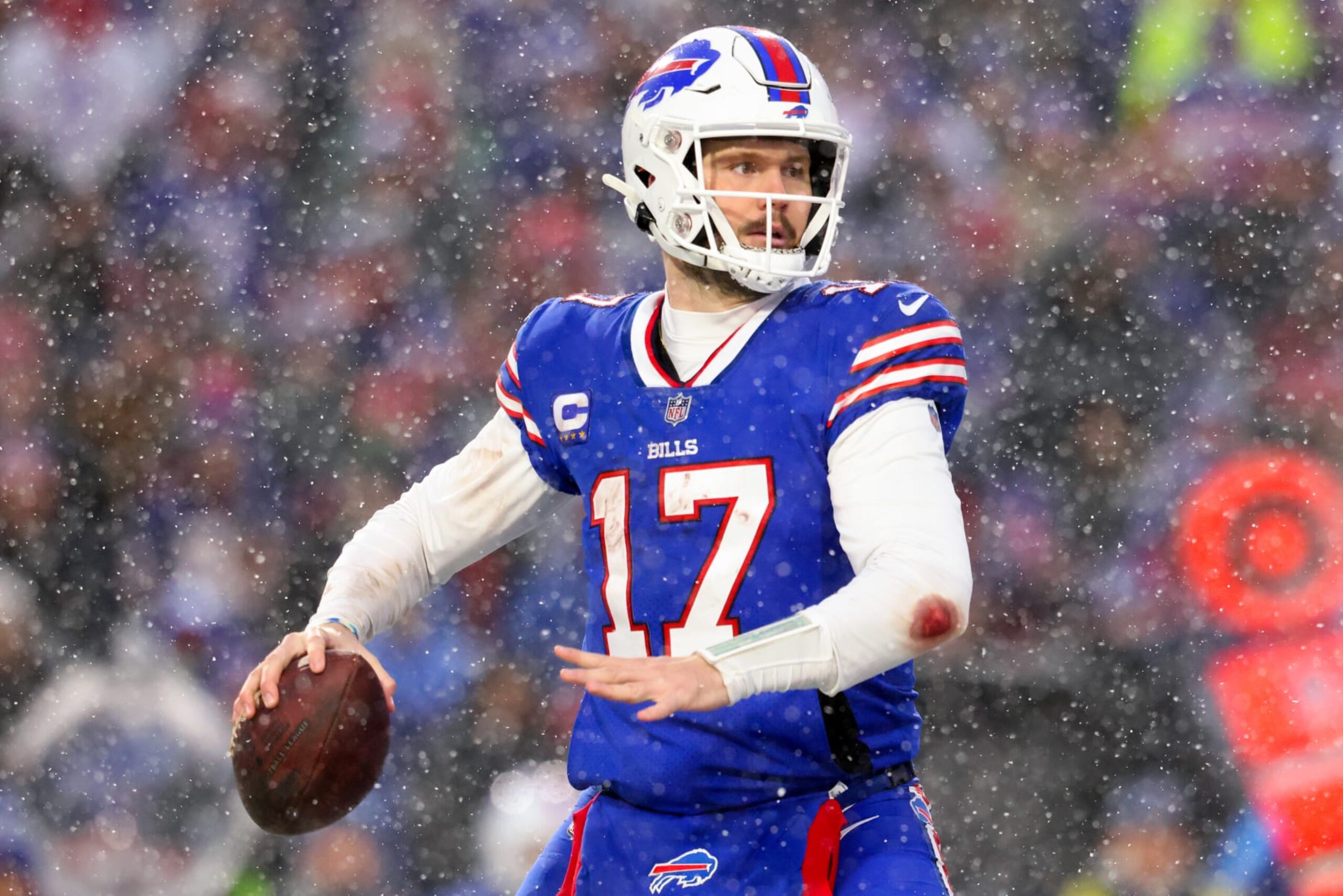 ORCHARD PARK, NEW YORK - JANUARY 22: Josh Allen #17 of the Buffalo Bills throws a pass against the Cincinnati Bengals during the second half in the AFC Divisional Playoff game at Highmark Stadium on January 22, 2023 in Orchard Park, New York. (Photo by Bryan M. Bennett/Getty Images) ORCHARD PARK, NEW YORK - JANUARY 22: Josh Allen #17 of the Buffalo Bills throws a pass against the Cincinnati Bengals during the second half in the AFC Divisional Playoff game at Highmark Stadium on January 22, 2023 in Orchard Park, New York. (Photo by Bryan M. Bennett/Getty Images)