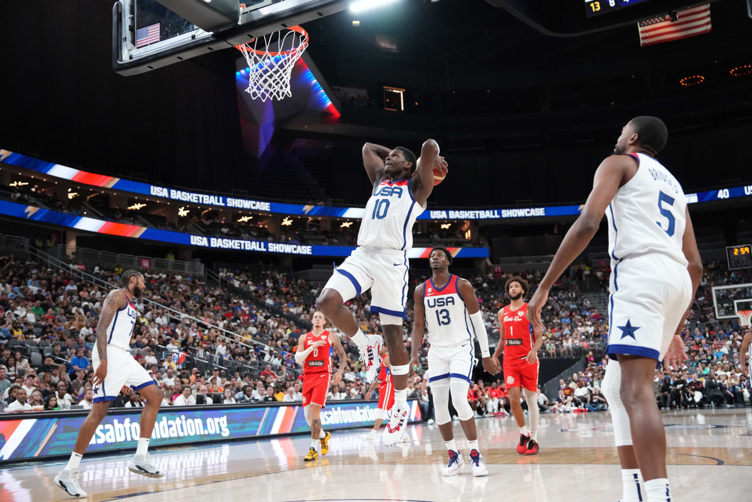 LAS VEGAS, NV - AUGUST 7: (EDITORS NOTE: Dunk sequence 2 of 6) Anthony Edwards #10 of the Senior Men's National Team drives to the basket during the 2023 FIBA World Cup exhibition game against the Puerto Rican National Team on August 7, 2023 at the T-Mobile Arena in Las Vegas, Nevada. NOTE TO USER: User expressly acknowledges and agrees that, by downloading and or using this photograph, User is consenting to the terms and conditions of the Getty Images License Agreement. Mandatory Copyright Notice: Copyright 2023 NBAE (Photo by Jesse D. Garrabrant/NBAE via Getty Images)