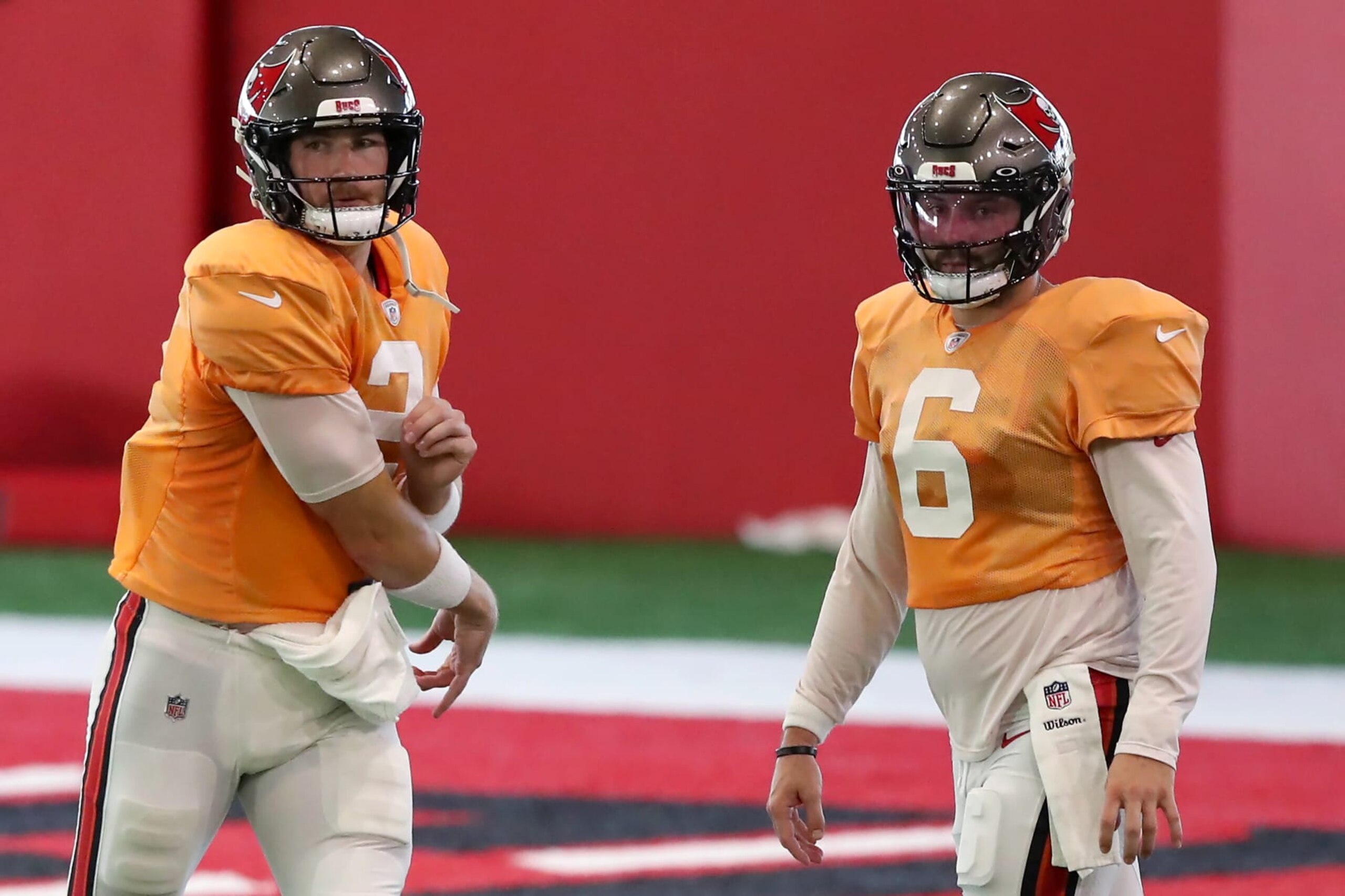TAMPA, FL - AUGUST 1: Tampa Bay Buccaneers Quarterback Kyle Trask (2) goes thru a drill as Quarterback Baker Mayfield (6) looks on during the Tampa Bay Buccaneers Training Camp on August 1, 2023 at the AdventHealth Training Center at One Buccaneer Place in Tampa, Florida. (Photo by Cliff Welch/Icon Sportswire via Getty Images)