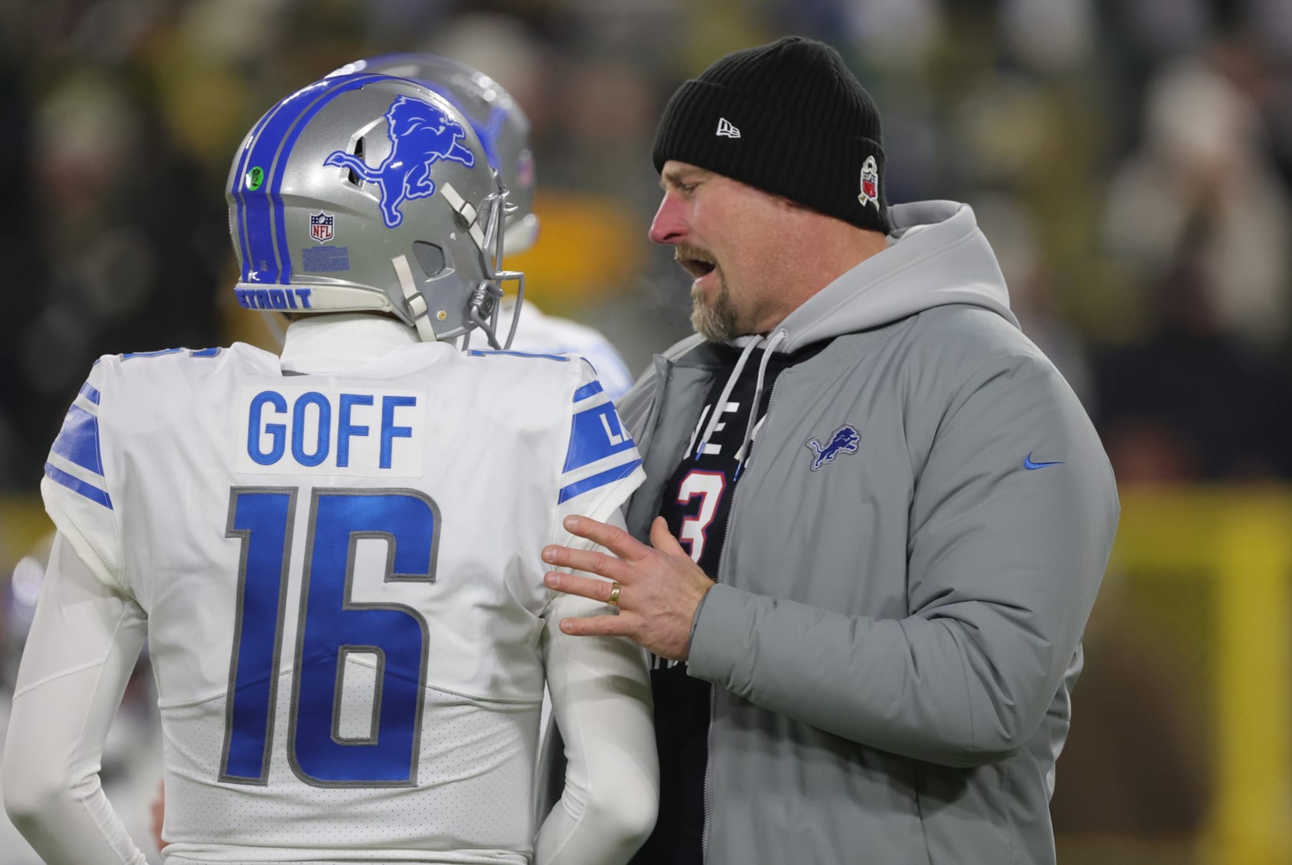 Quarterback Jared Goff and head coach Dan Campbell.