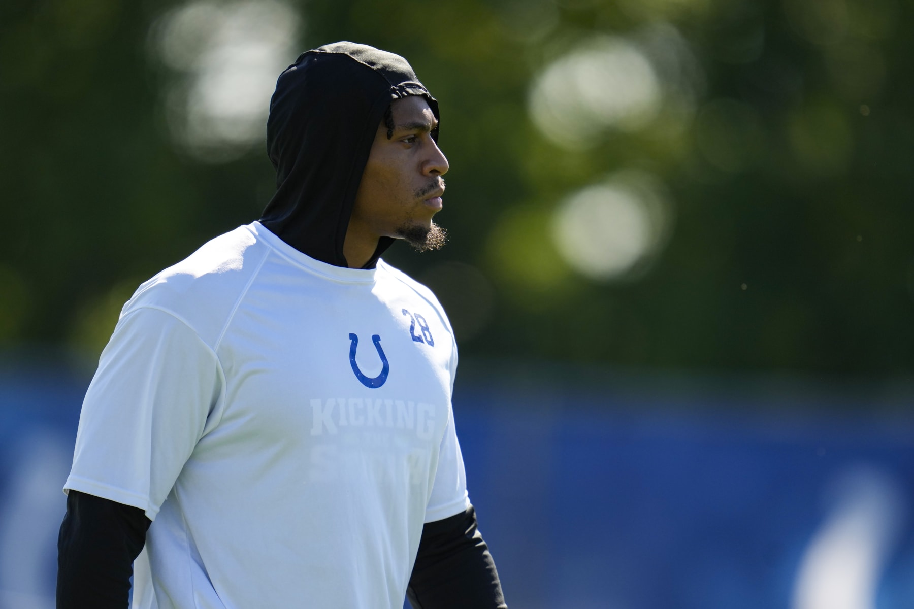 Indianapolis Colts running back Jonathan Taylor watches drills during practice at the NFL team's football training camp in Westfield, Ind., Monday, July 31, 2023. (AP Photo/Michael Conroy)