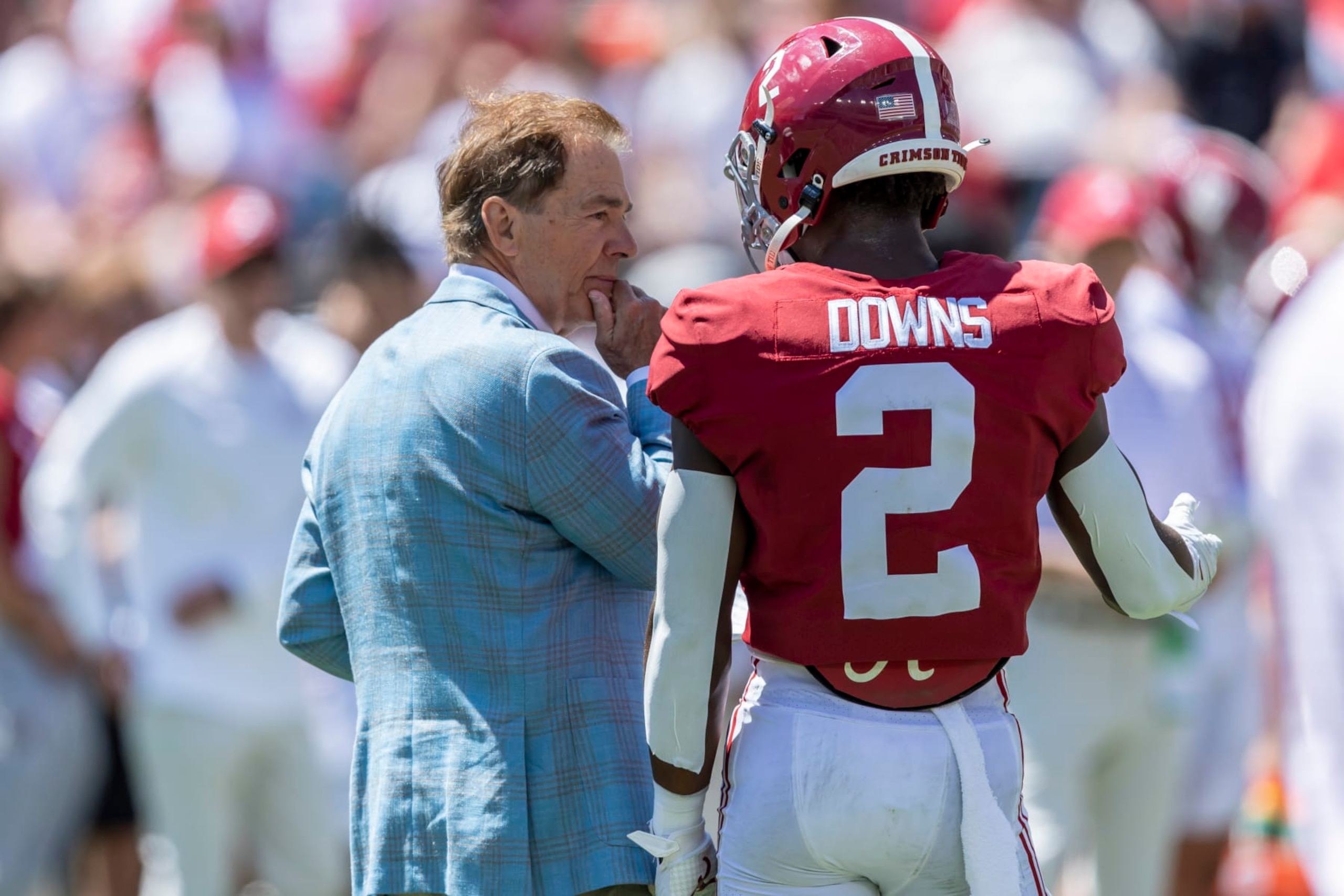 Alabama head coach Nick Saban talks with Alabama defensive back Caleb Downs (2) as the team warms up before Alabama's A-Day NCAA college football scrimmage, Saturday, April 22, 2023, in Tuscaloosa, Ala. (AP Photo/Vasha Hunt)