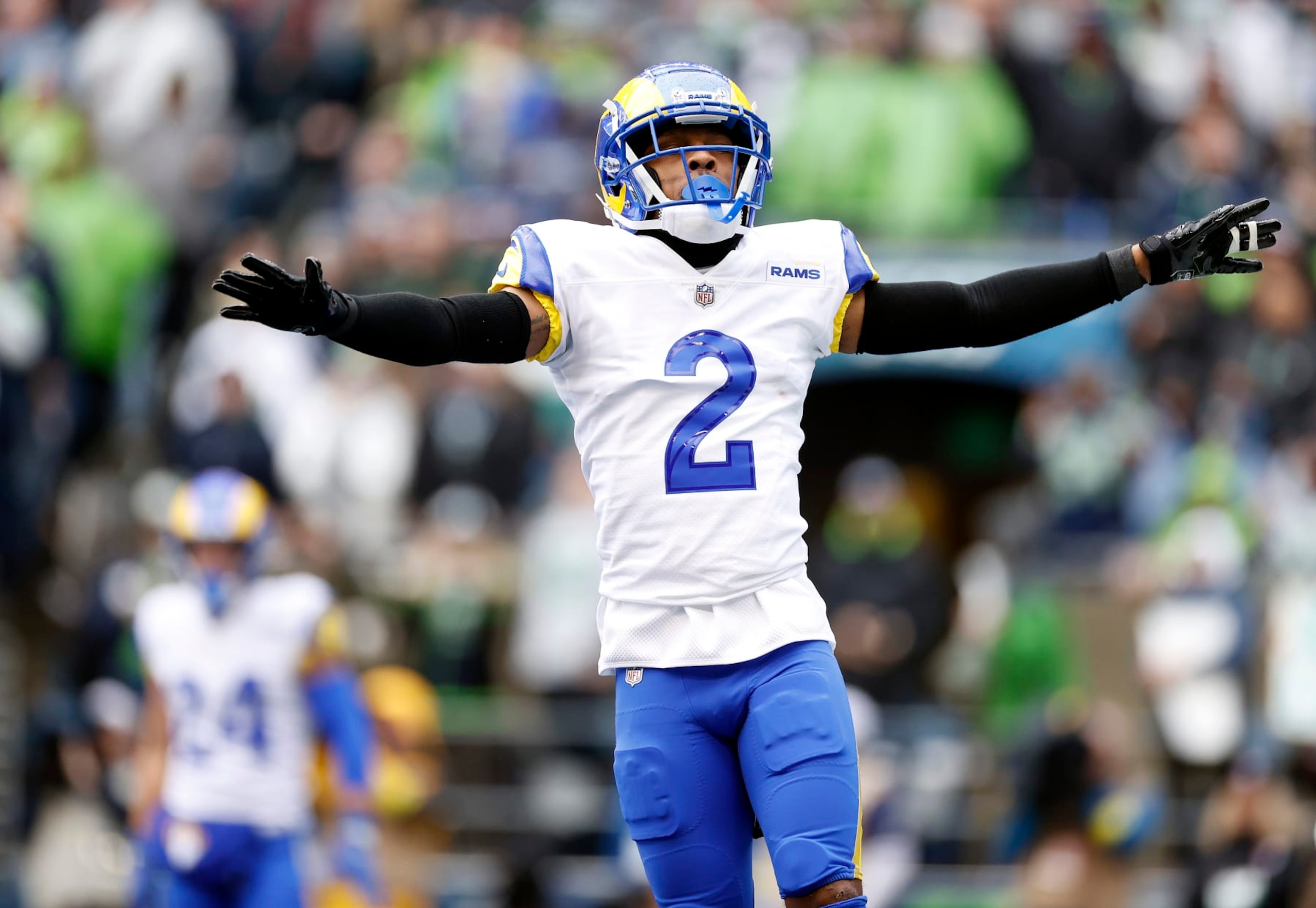 SEATTLE, WASHINGTON - JANUARY 08: Troy Hill #2 of the Los Angeles Rams celebrates after a defensive stop during the first quarter against the Seattle Seahawks at Lumen Field on January 08, 2023 in Seattle, Washington. (Photo by Steph Chambers/Getty Images)