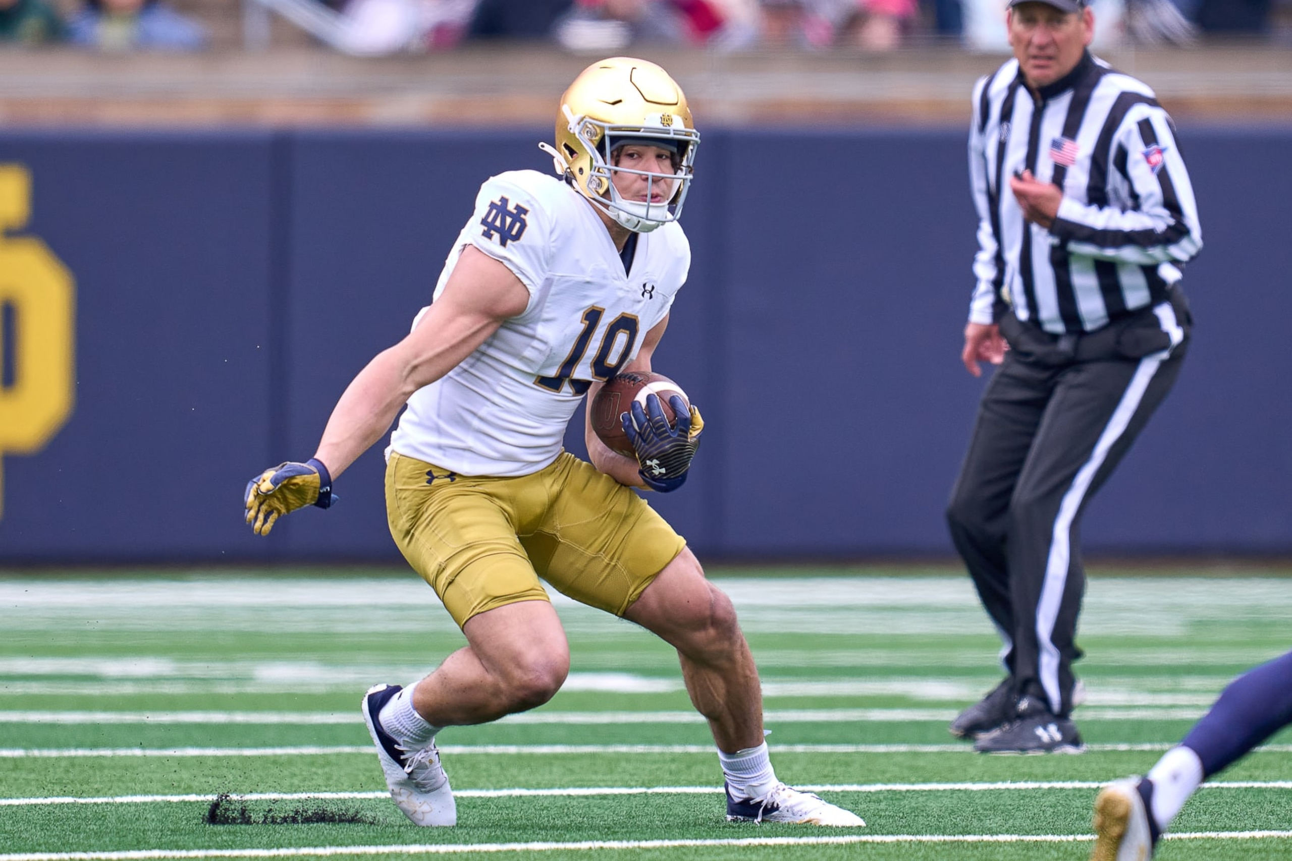 SOUTH BEND, INDIANA - APRIL 22: Notre Dame Fighting Irish wide receiver Jaden Greathouse #19 runs with the football during the Notre Dame Blue-Gold Spring Football Game at Notre Dame Stadium on April 22, 2023 in South Bend, Indiana. (Photo by Robin Alam/Icon Sportswire via Getty Images)