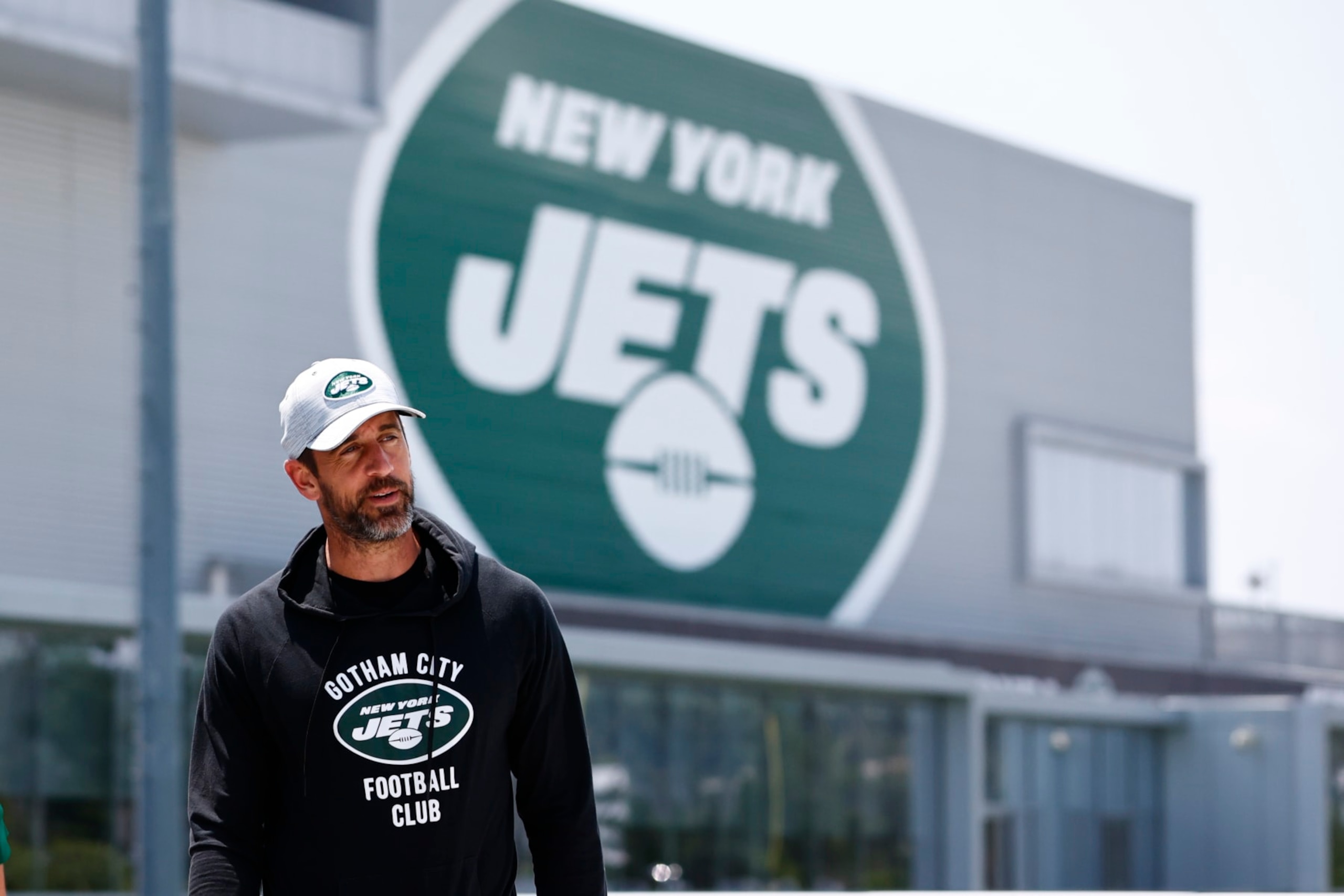 FLORHAM PARK, NEW JERSEY - JULY 26: Quarterback Aaron Rodgers #8 of the New York Jets walks to the media tent to talk to reporters after training camp at Atlantic Health Jets Training Center on July 26, 2023 in Florham Park, New Jersey. (Photo by Rich Schultz/Getty Images)