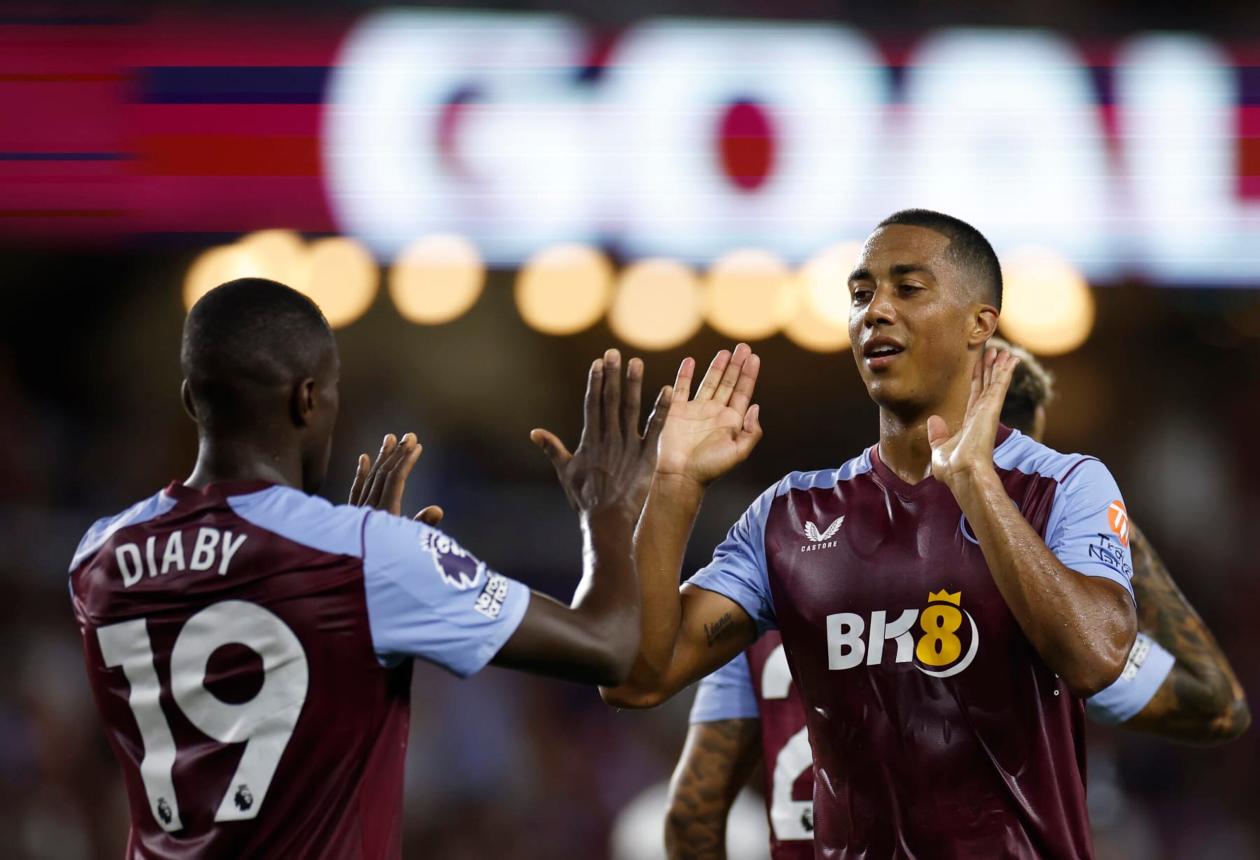 ORLANDO, FLORIDA - JULY 26: Moussa Diaby of Aston Villa celebrates with teammate Youri Tielemans after scoring the teams second goal during the Premier League Summer Series match between Aston Villa and Fulham FC at Exploria Stadium on July 26, 2023 in Orlando, Florida. (Photo by James Gilbert/Getty Images for Premier League)