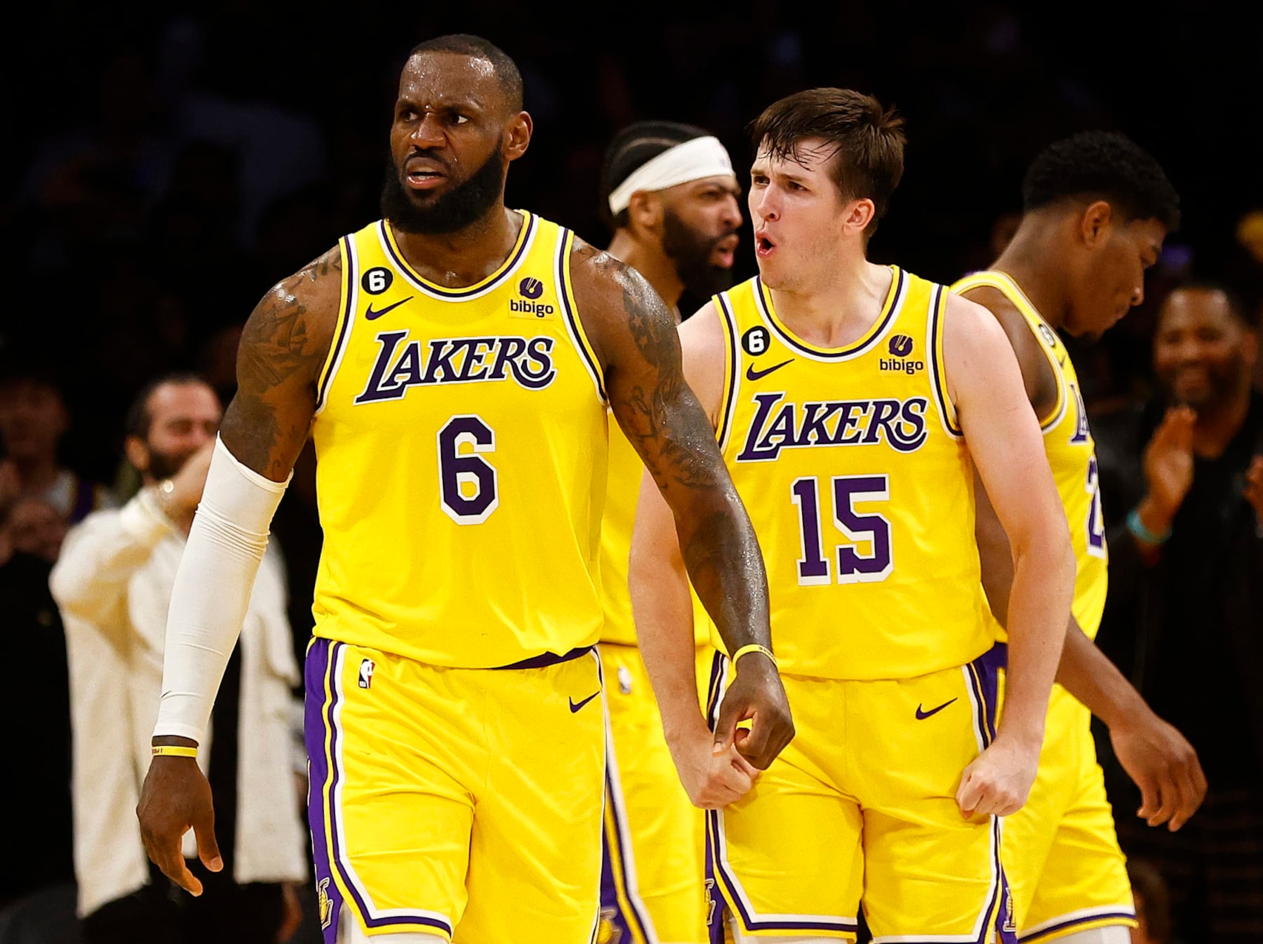 LOS ANGELES, CALIFORNIA - APRIL 24:  LeBron James #6 and Austin Reaves #15 of the Los Angeles Lakers react against the Memphis Grizzlies in overtime of Game Four of the Western Conference First Round Playoffs at Crypto.com Arena on April 24, 2023 in Los Angeles, California.  NOTE TO USER: User expressly acknowledges and agrees that, by downloading and/or using this photograph, user is consenting to the terms and conditions of the Getty Images License Agreement. (Photo by Ronald Martinez/Getty Images)