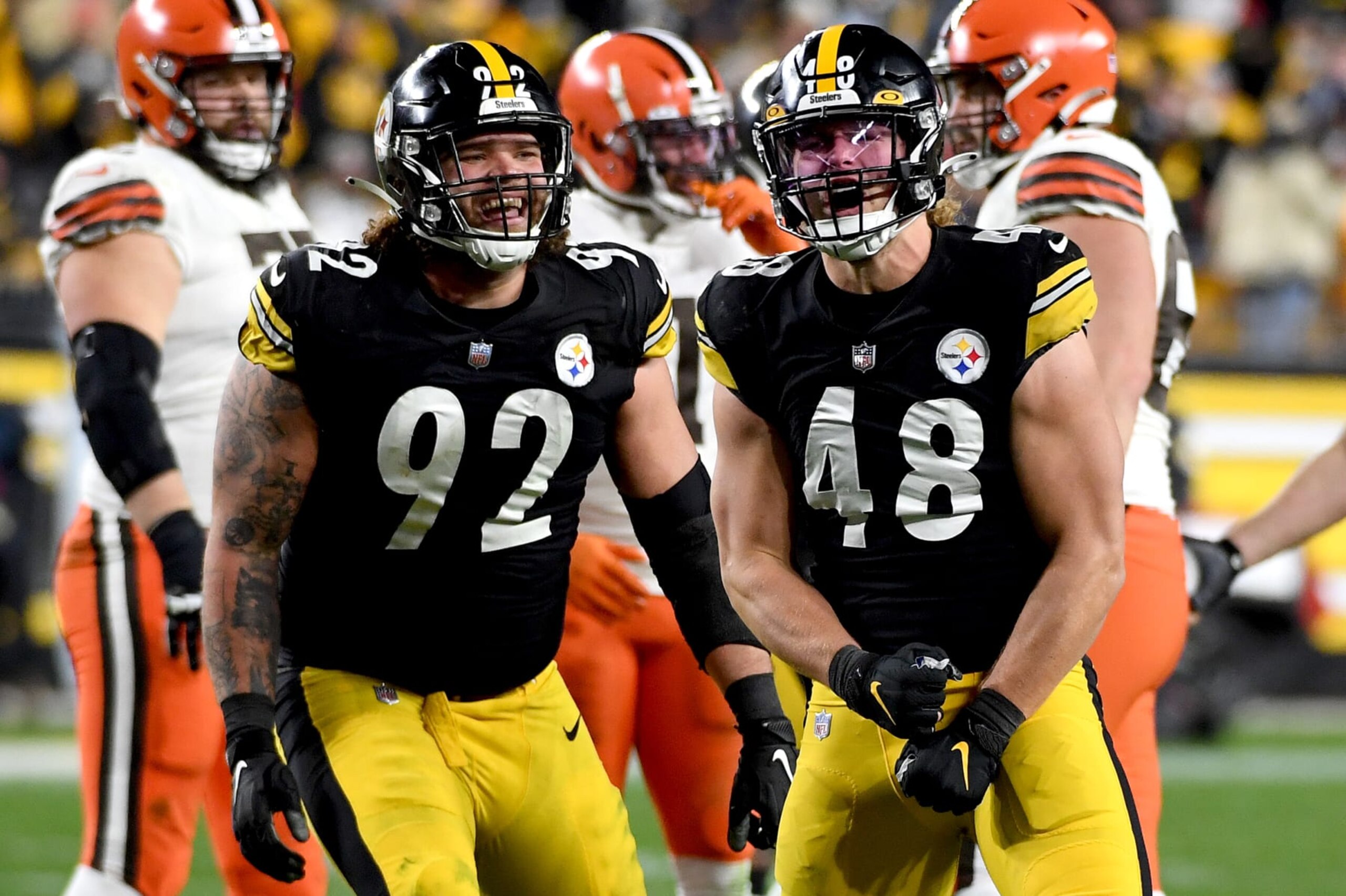 PITTSBURGH, PENNSYLVANIA - JANUARY 03: Derrek Tuszka #48 of the Pittsburgh Steelers celebrates a sack with teammate Isaiahh Loudermilk #92 in the fourth quarter of the game against the Cleveland Browns at Heinz Field on January 03, 2022 in Pittsburgh, Pennsylvania. (Photo by Justin Berl/Getty Images)